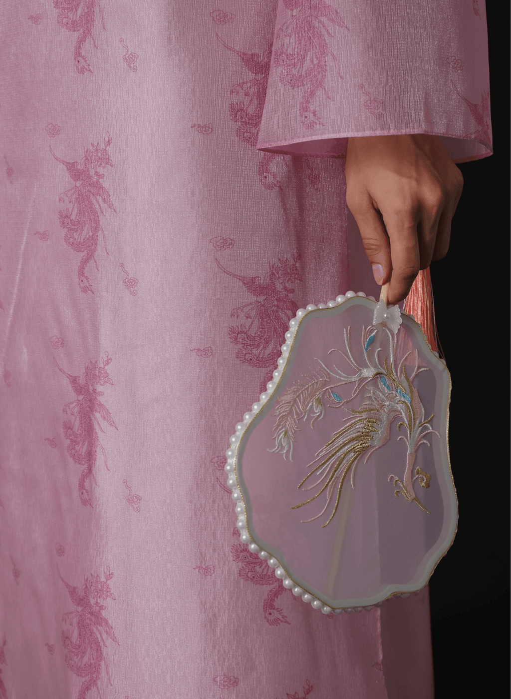 "Thy Loan Ao dai set in light pink silk, modern pattern, traditional Vietnamese dress."