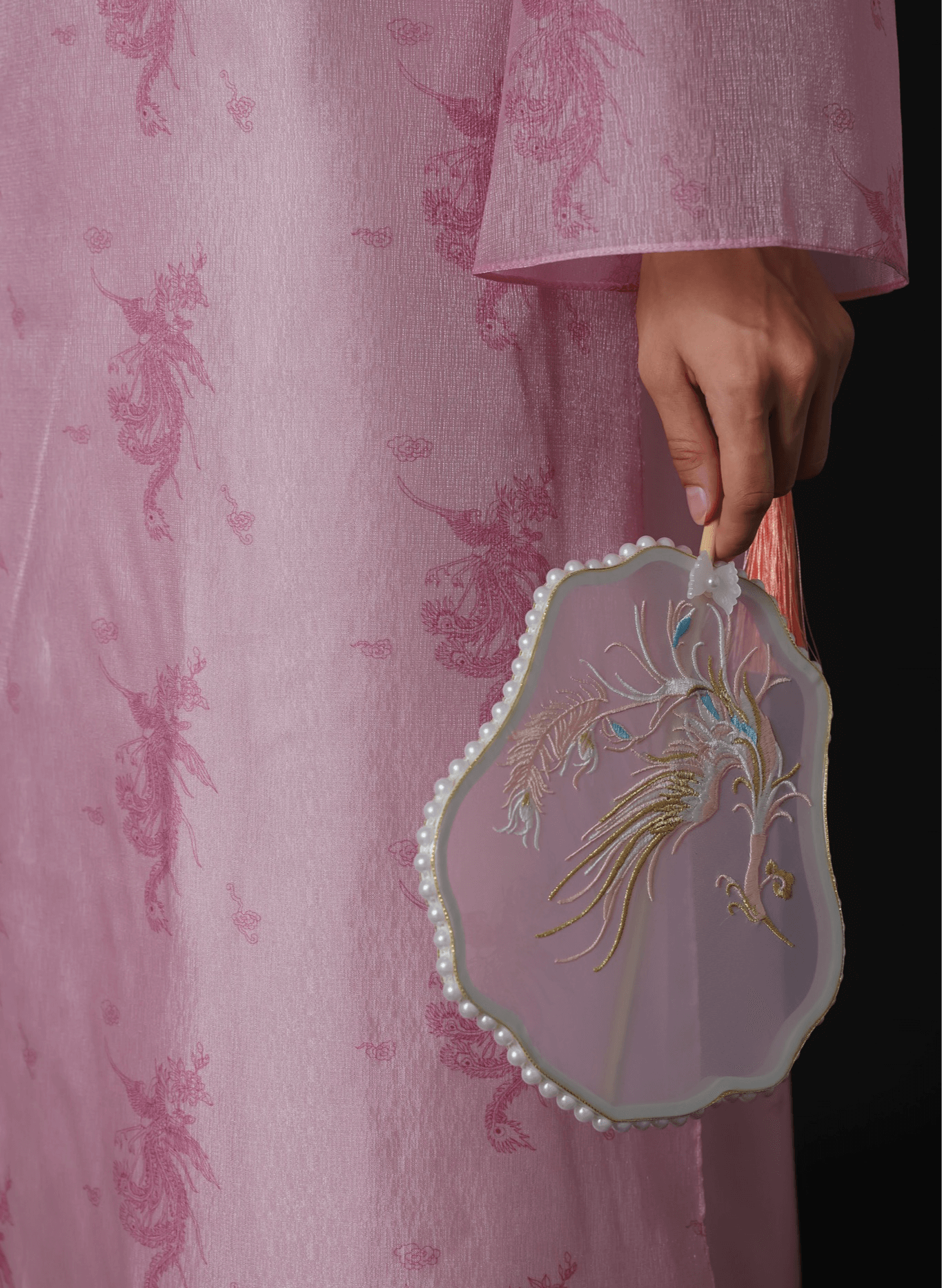 "Thy Loan Ao dai set in light pink silk, modern pattern, traditional Vietnamese dress."