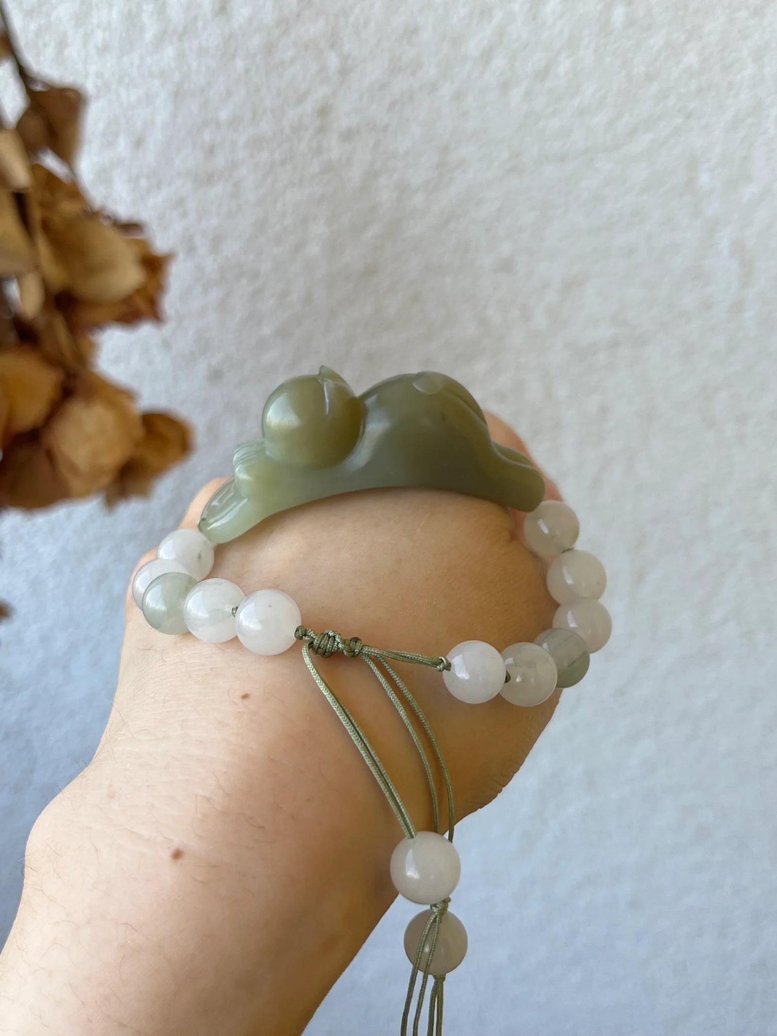 Fortune's Embrace – Nephrite Jade Lucky Cat Bracelet - worn presentation in green, white by L'Orient Haus