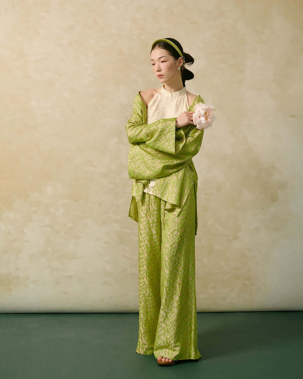 “Silken Poise” Cardigan – Worm Silk Heritage in Antique Young Rice Celadon - side profile by Hy Phuong