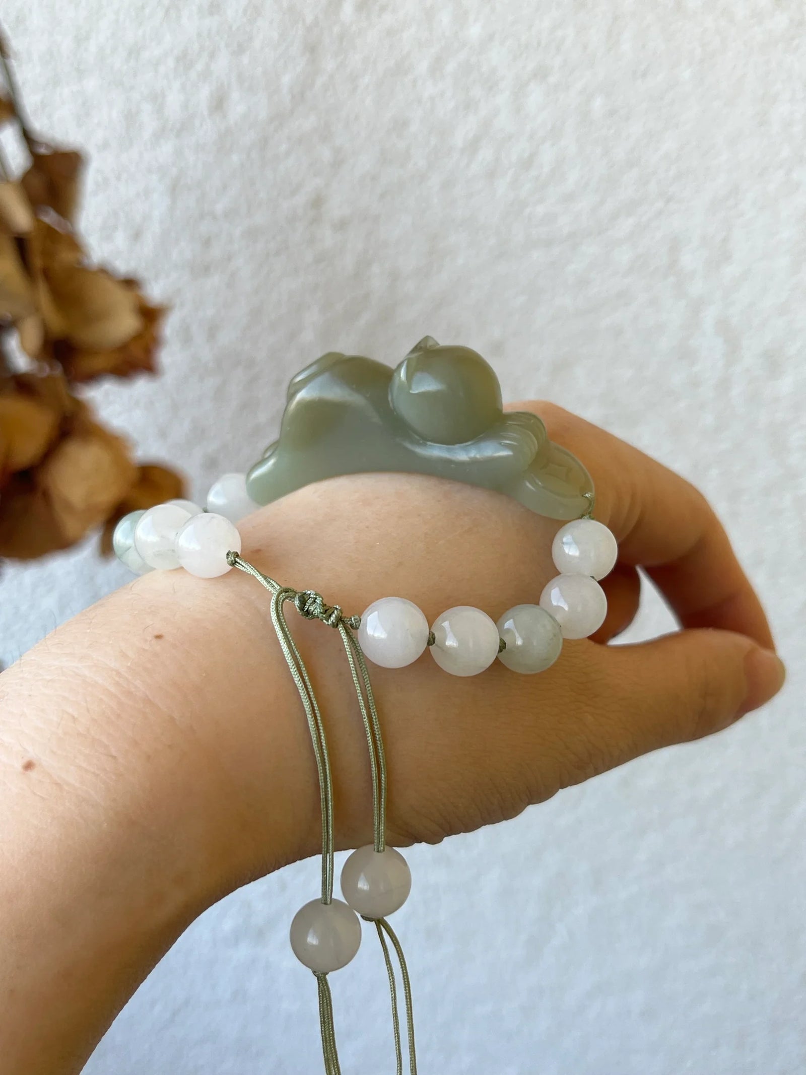 Fortune's Embrace – Nephrite Jade Lucky Cat Bracelet - worn presentation in white, green by L'Orient Haus