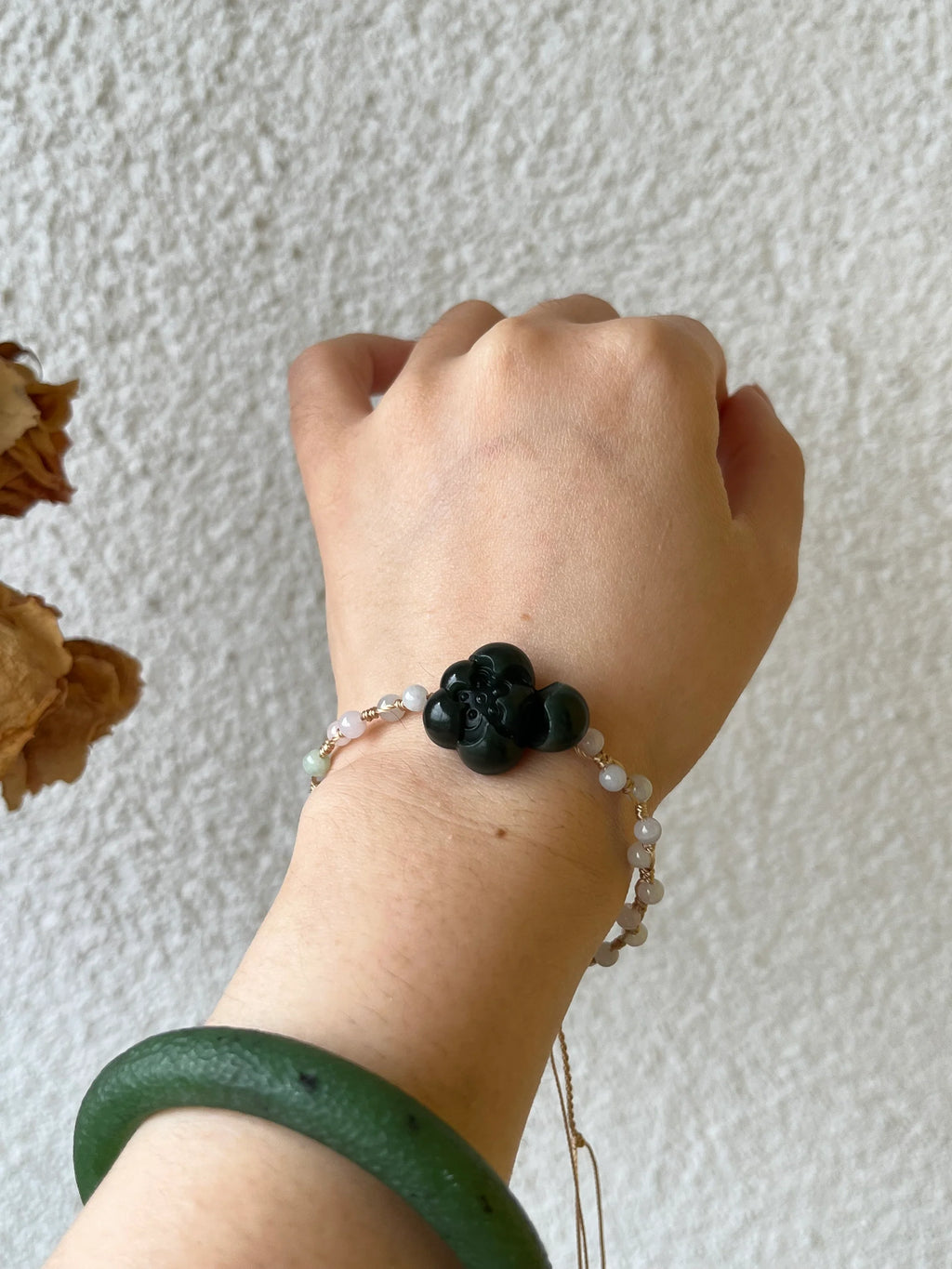 Lotus Noir - Handmade Bracelet with a Dark Cyan Hetian Jade Lotus | 手编和田青玉一细小荷花手牌 - worn presentation by L'Orient Haus