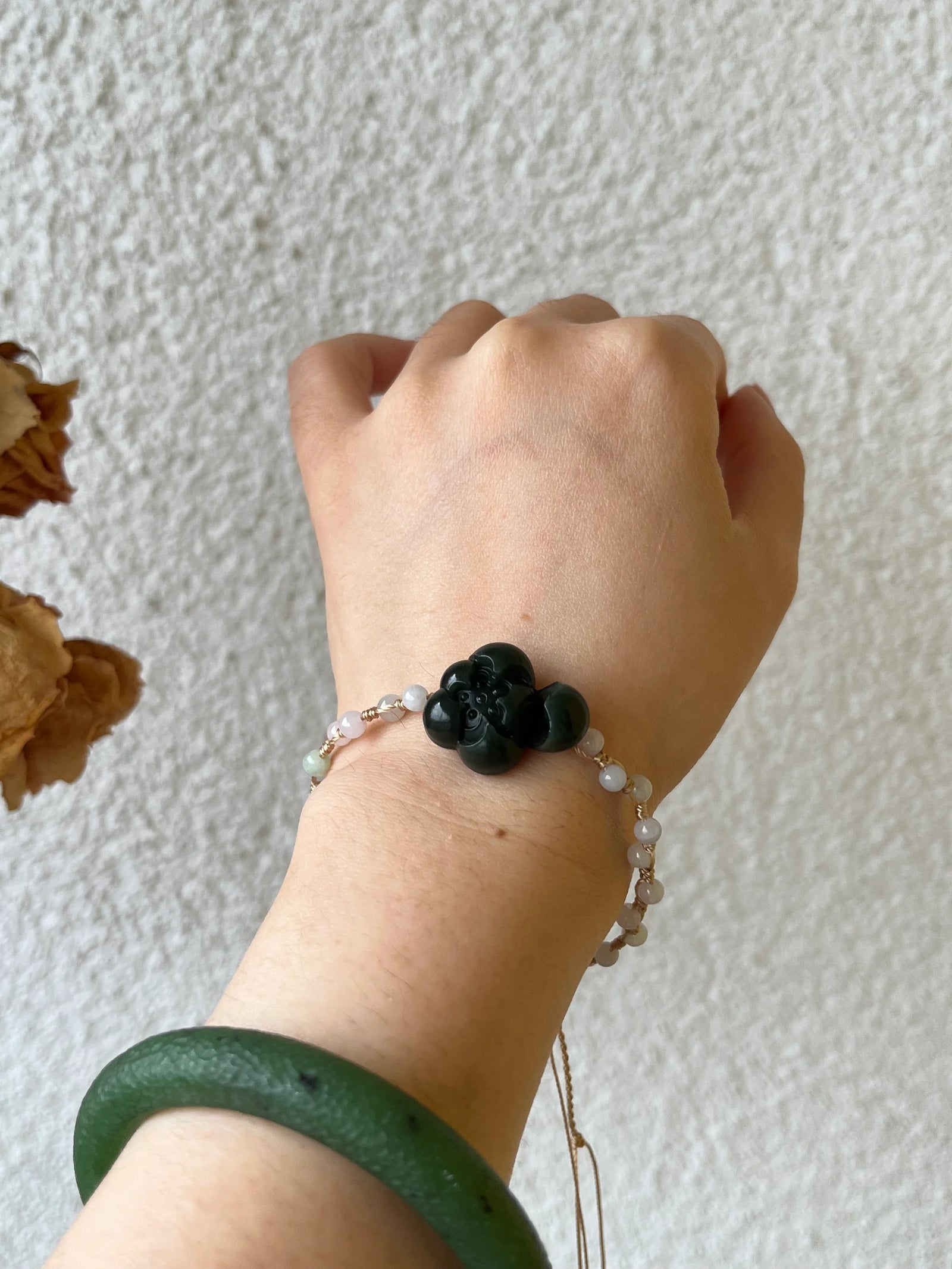 Lotus Noir - Handmade Bracelet with a Dark Cyan Hetian Jade Lotus | 手编和田青玉一细小荷花手牌 - worn presentation by L'Orient Haus