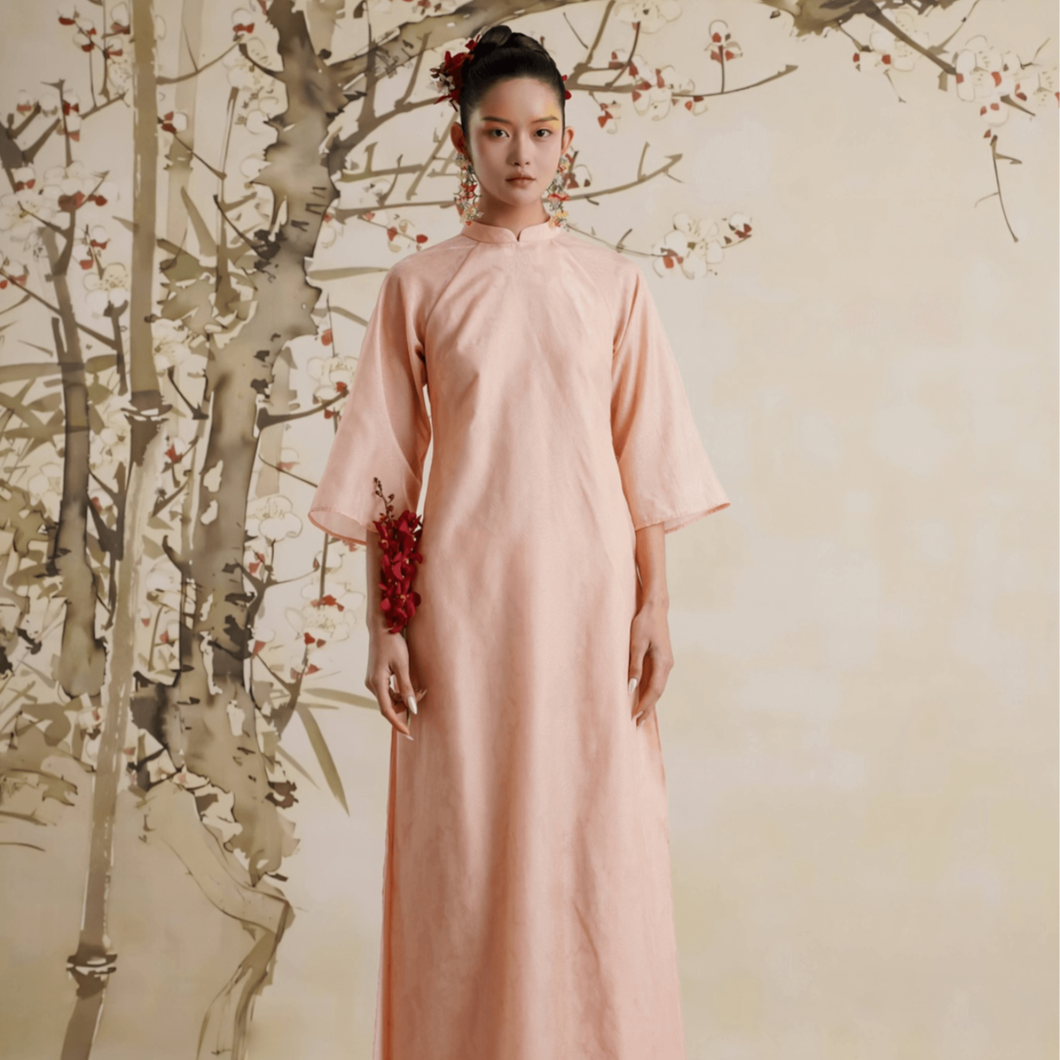 "Uyen My Ao Dai Set in salmon pink silk, traditional Vietnamese dress by Lalin, showcasing cultural heritage."