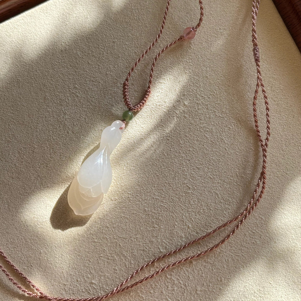 Blush Magnolia – Icy Pink Hetian Jade Pendant - flat lay display in cotton in #fff by L'Orient Haus