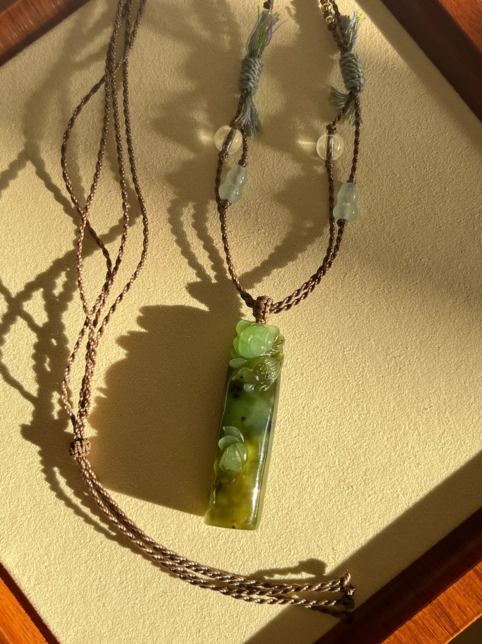 “Song of the Lotus” - Hand Carved Green Hetian Jade Lotus and Magpie Pendant | 手雕和田碧玉喜鹊荷花吊坠