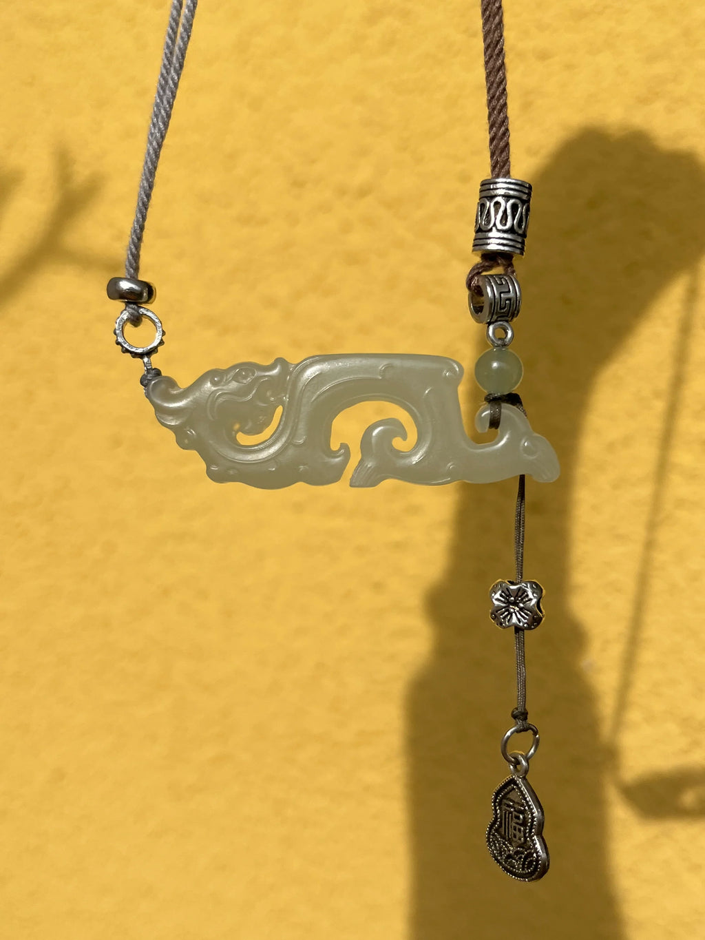 Traditional Motif - Celestial Dragon – Hand-Carved Nephrite Jade Necklace - front view in white by L'Orient Haus