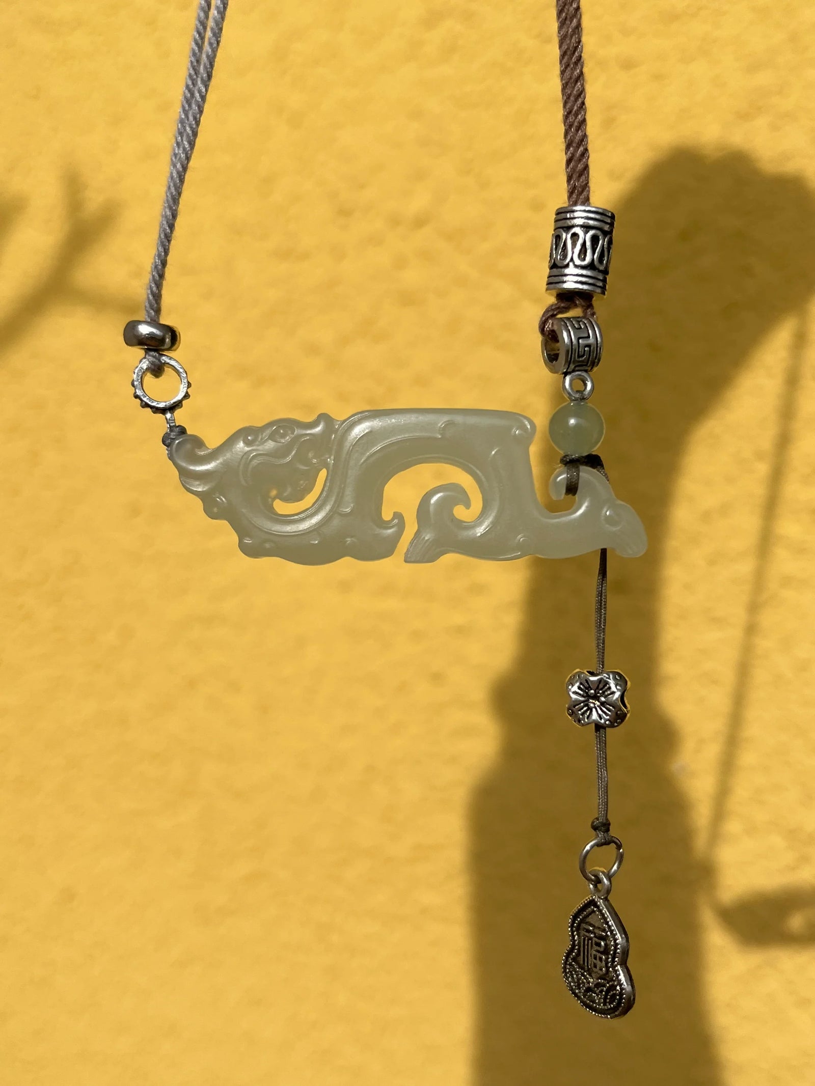 Traditional Motif - Celestial Dragon – Hand-Carved Nephrite Jade Necklace - front view in white by L'Orient Haus