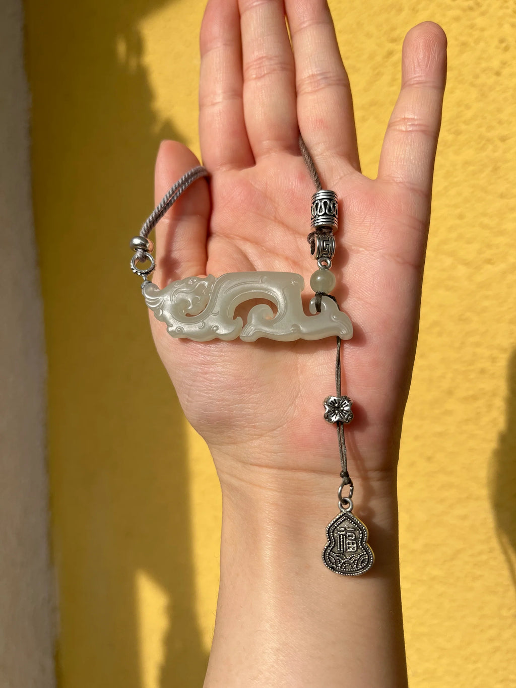 Traditional Motif - Celestial Dragon – Hand-Carved Nephrite Jade Necklace - front view in white by L'Orient Haus