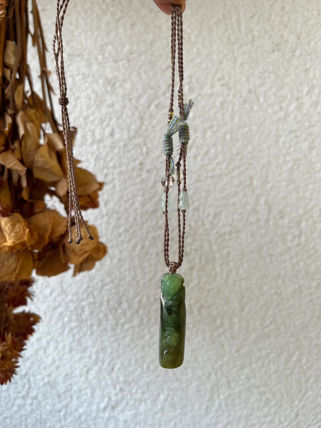 “Song of the Lotus” - Hand Carved Green Hetian Jade Lotus and Magpie Pendant | 手雕和田碧玉喜鹊荷花吊坠 - detail close-up