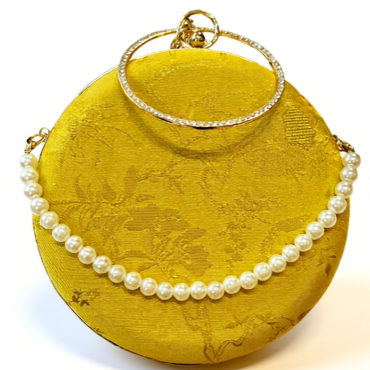 Traditional Motif - “Nguyệt Tú” – Silk Brocade Round Clutch with Metal Handle - flat lay display in yellow by Moc - Bags