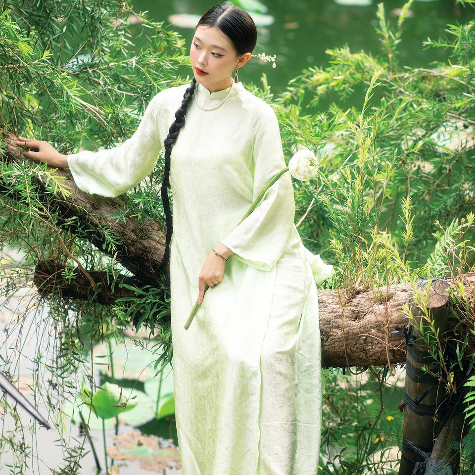 "Cuc Hoa Ao Dai set in light green wormsilk, traditional Vietnamese dress by Moc."