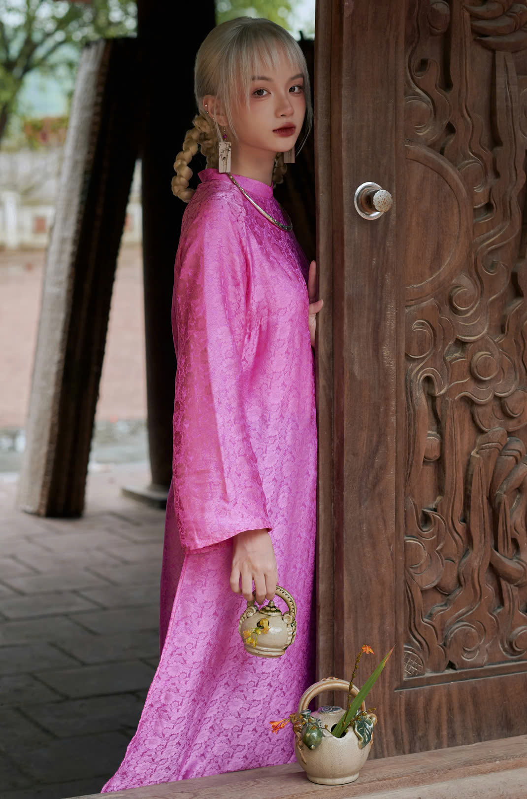 "Traditional Vietnamese Ao dai in pink silk jacquard, artisan design by Moc"