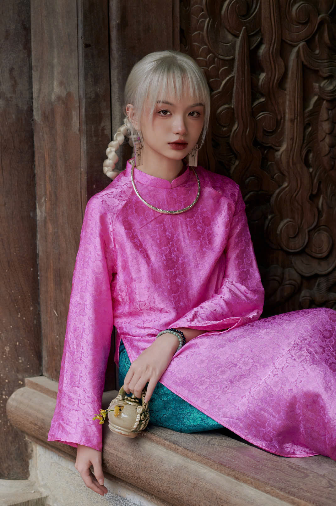 "Cuc Hoa Ao Dai set in pink wormsilk, traditional Vietnamese dress with green jacquard pants, artisan design"