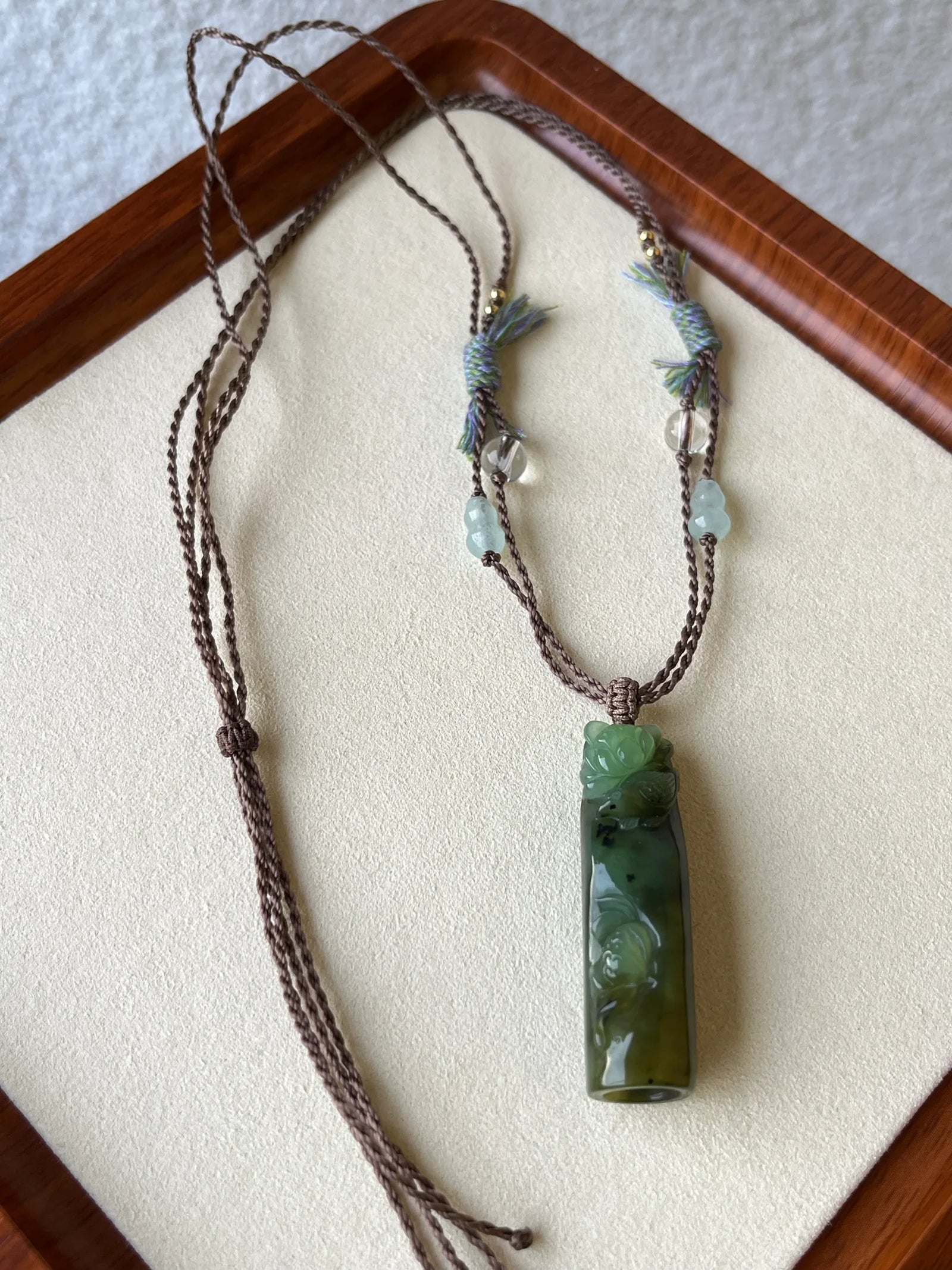 “Song of the Lotus” - Hand Carved Green Hetian Jade Lotus and Magpie Pendant | 手雕和田碧玉喜鹊荷花吊坠