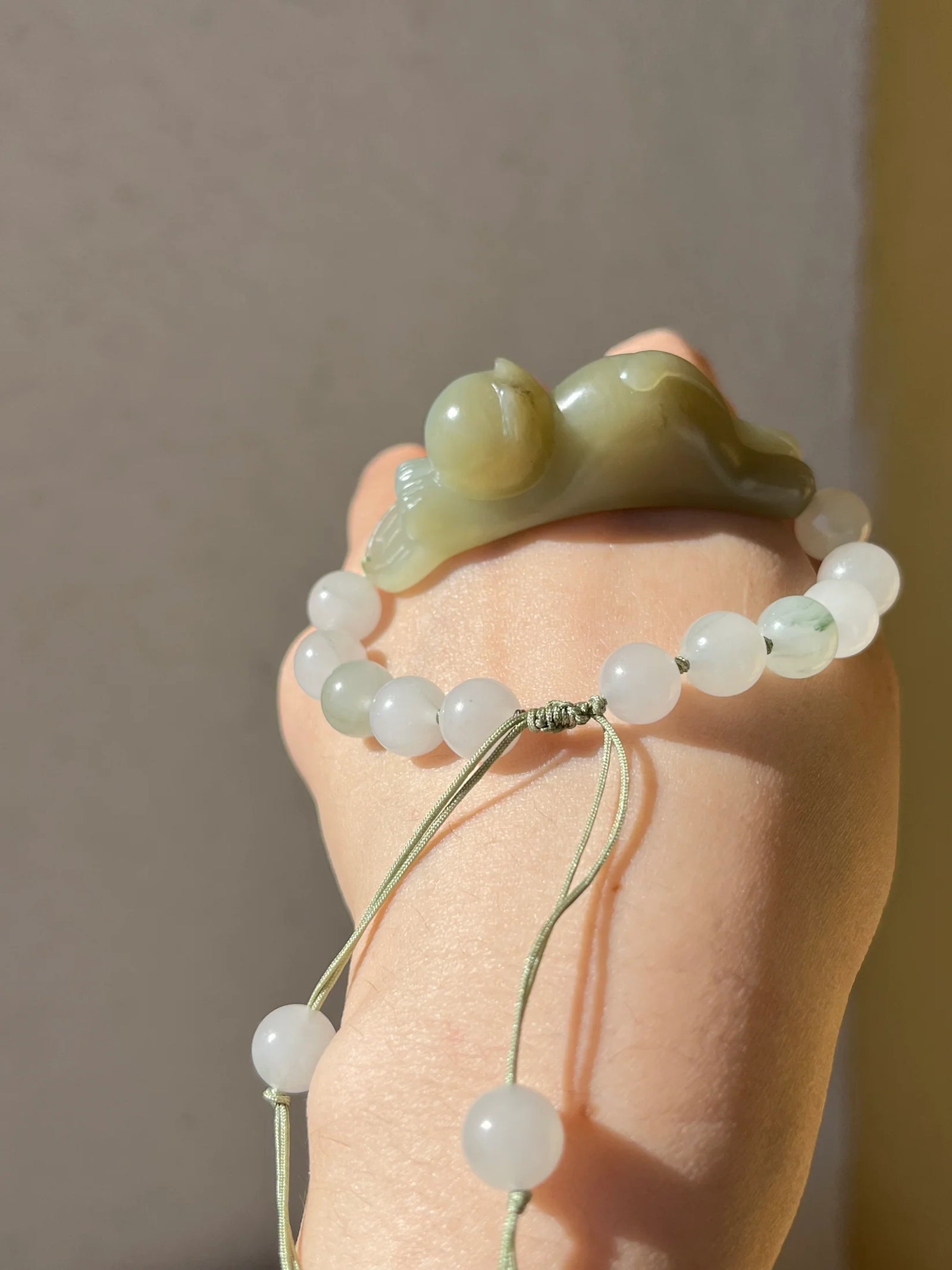 Vietnamese Silver - Fortune's Embrace – Nephrite Jade Lucky Cat Bracelet - worn presentation in white, green by L'Orient Haus