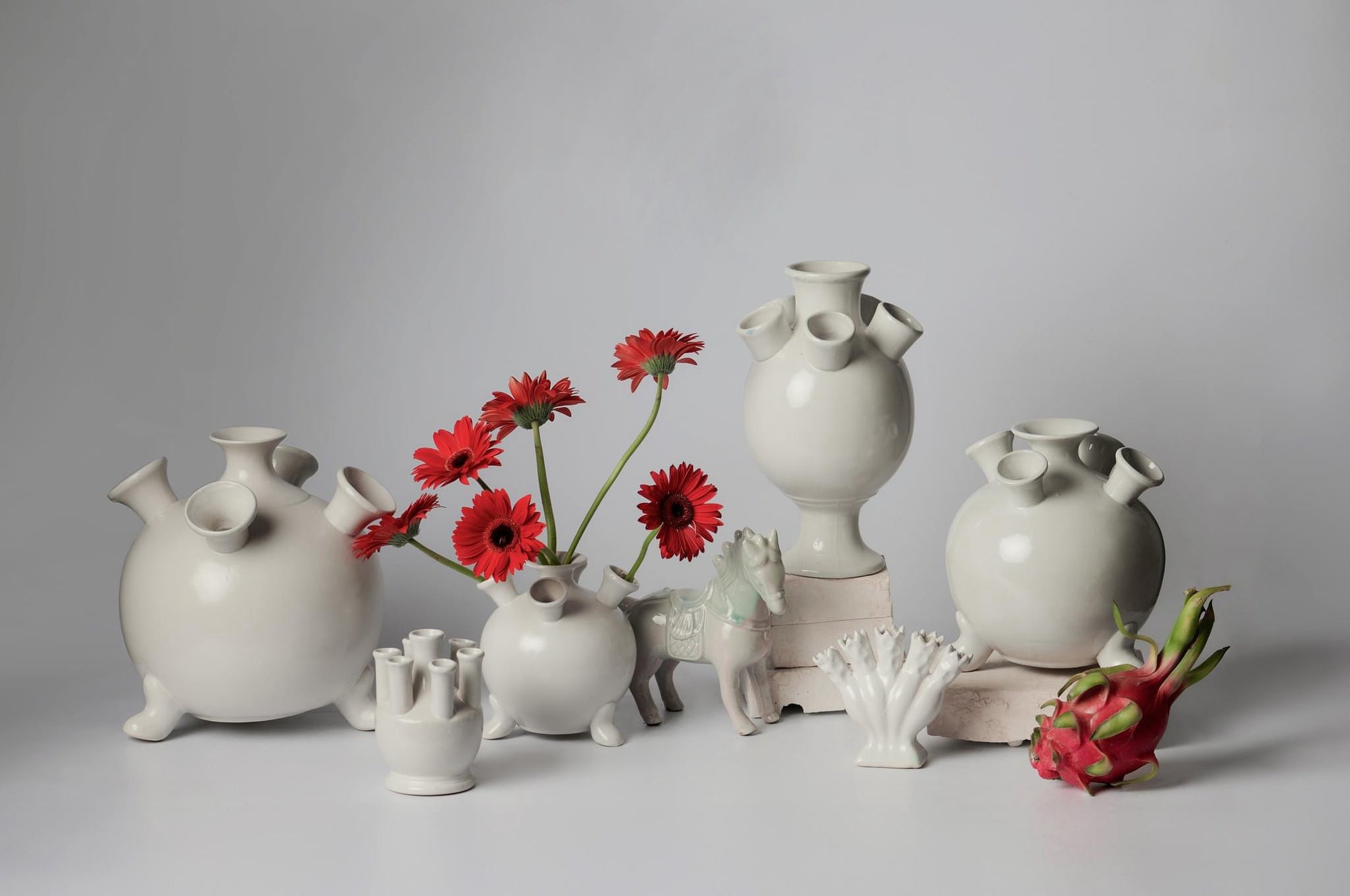 "Bat Trang ceramics - 5-bulb Tulipiere Vase in white, traditional Vietnamese design with red floral accents."