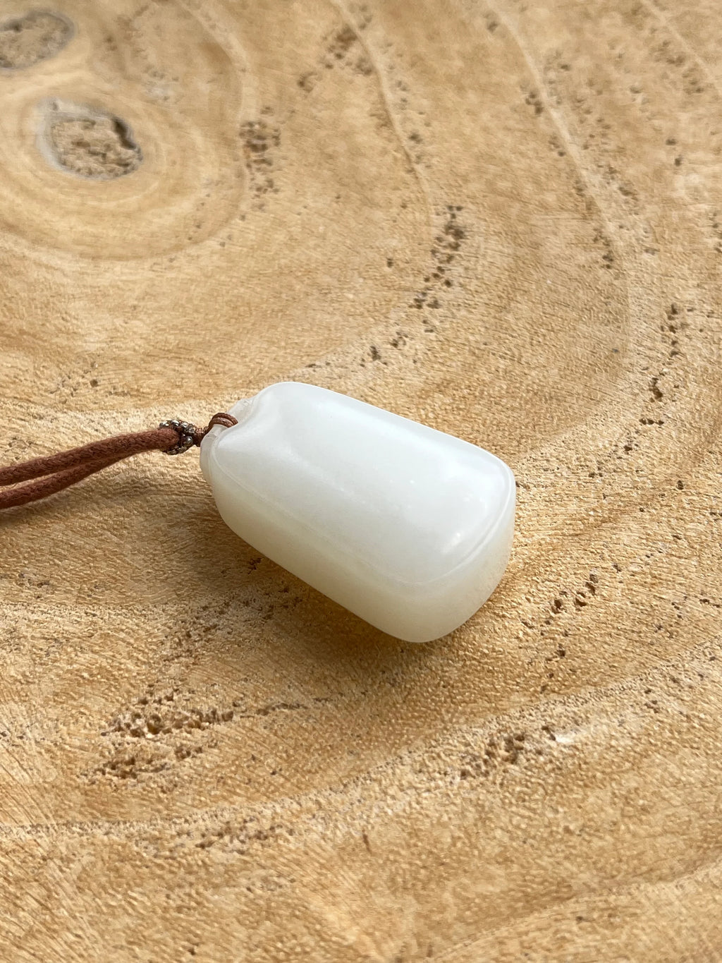 Serene Jade - Hetian Jade Mutton Fat Flat Pendant | 俄白羊脂无事牌 - flat lay display by L'Orient Haus