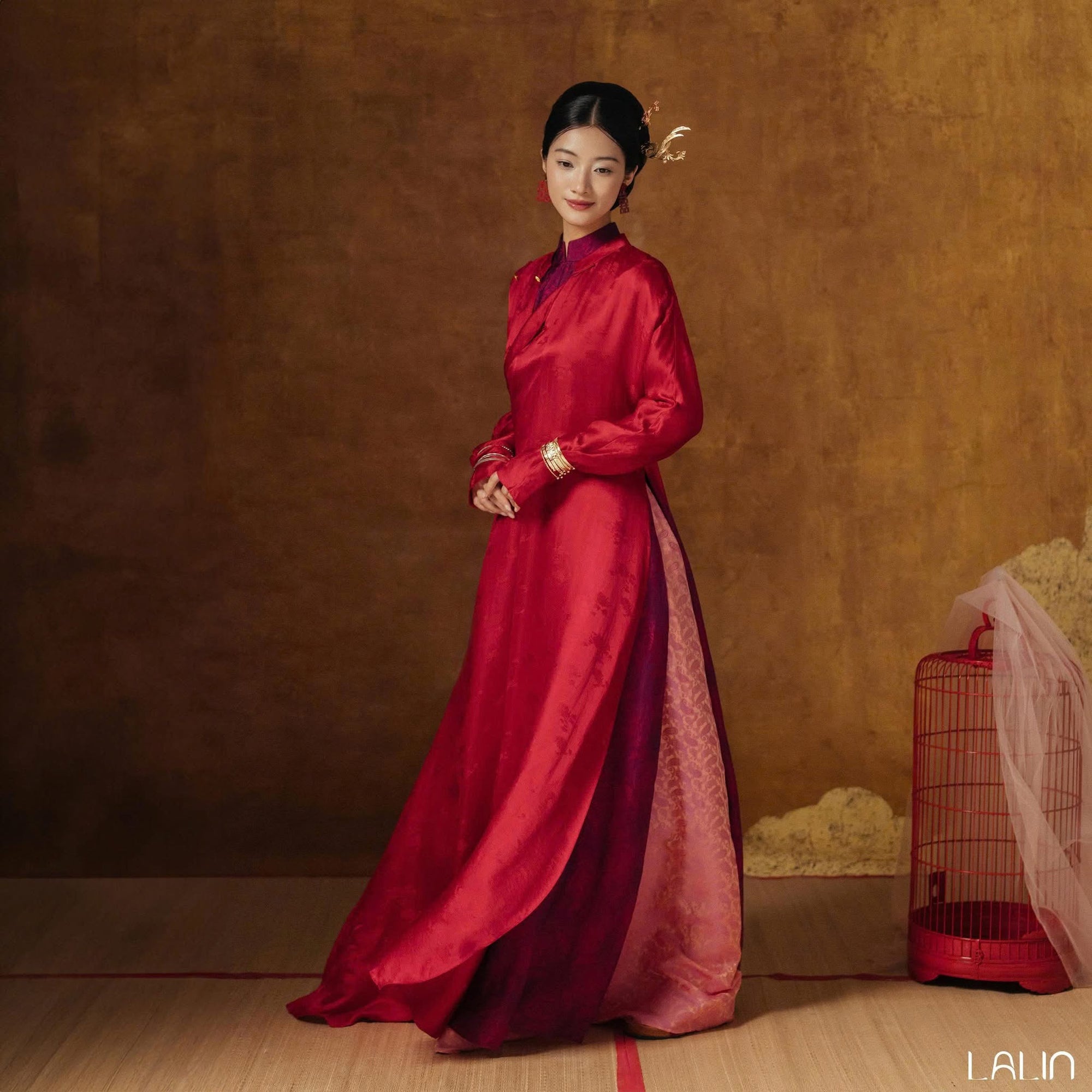 Thy Giao Ao-dai Set – Luxury Double-layer Hand-Embroidered WormSilk in Crimsom [Wedding Collection] by Lalin - side view highlighting elegant silhouette and fabric drape, premium Vietnamese silk clothing