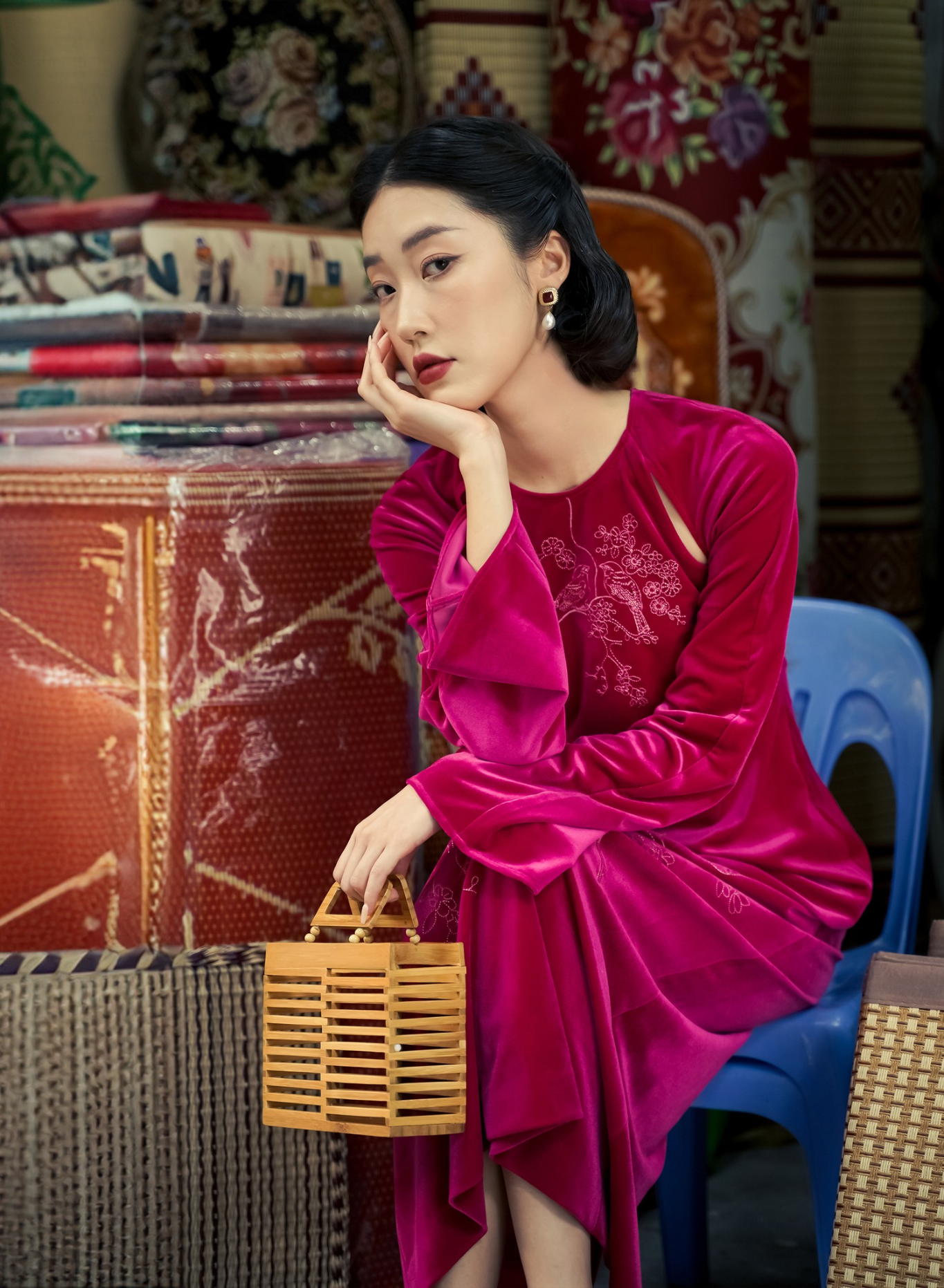 "Red velvet Ao Dai halter dress 'Diem Quyen' by Lalin, featuring cut-out embroidery, showcasing Vietnamese cultural heritage."