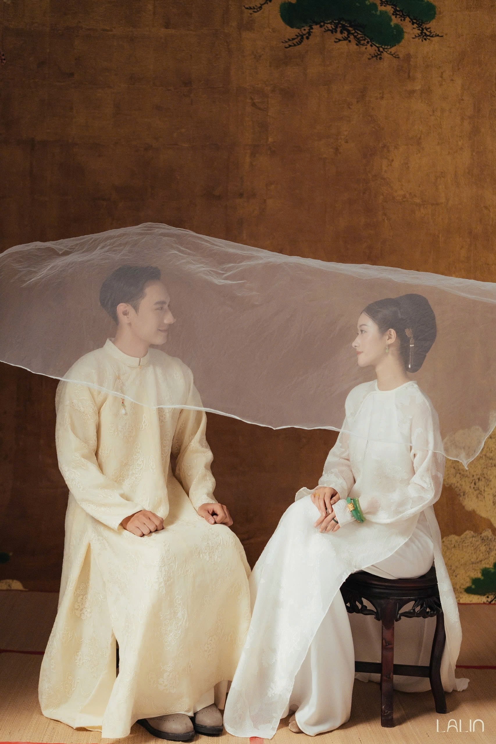 Tuyet Giao Ao-dai Set – Premium Double-layer Hand-Embroidered WormSilk in White [Wedding Collection] by Lalin - back view showing intricate details and cultural authenticity, premium Vietnamese silk clothing