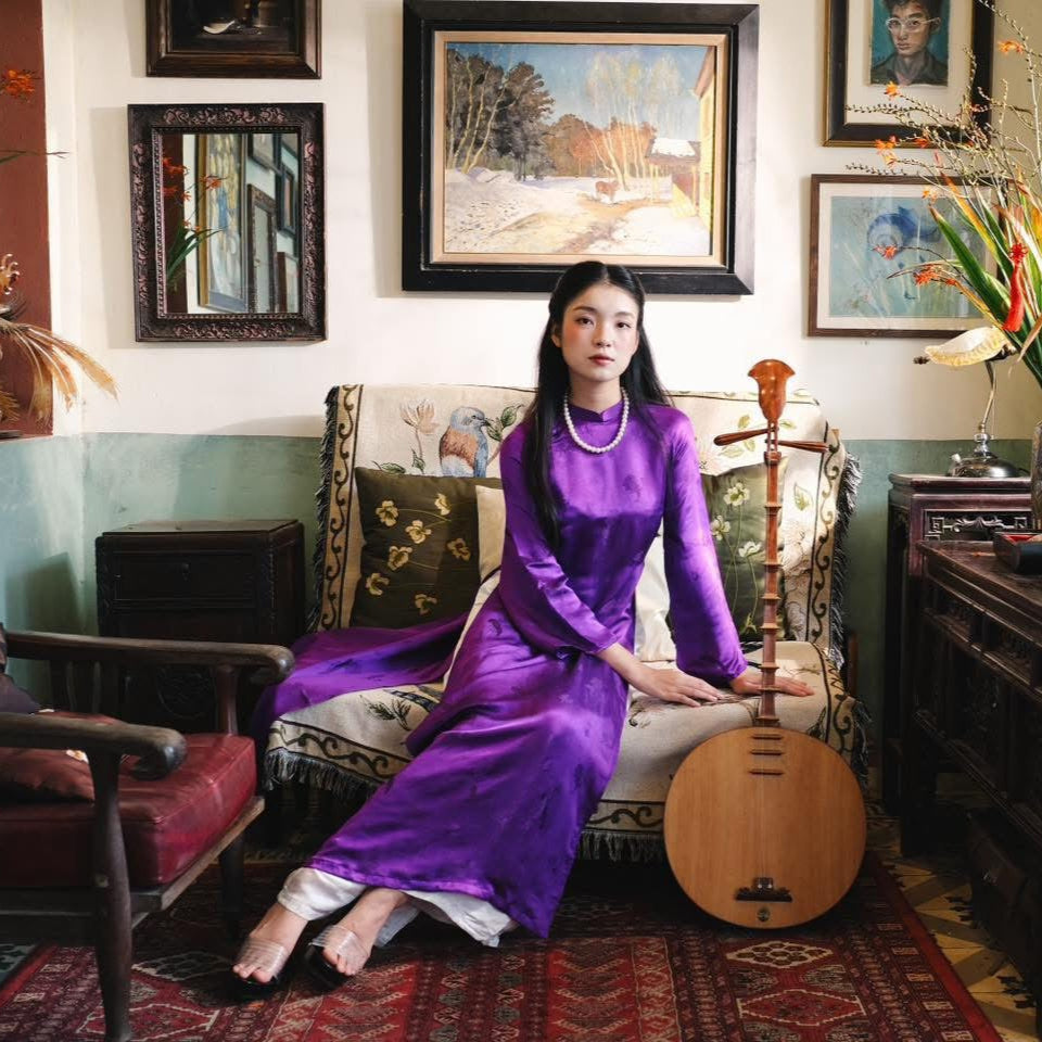 "Purple silk Lien Hoa Ao Dai set by Moc, traditional Vietnamese dress with modern design."
