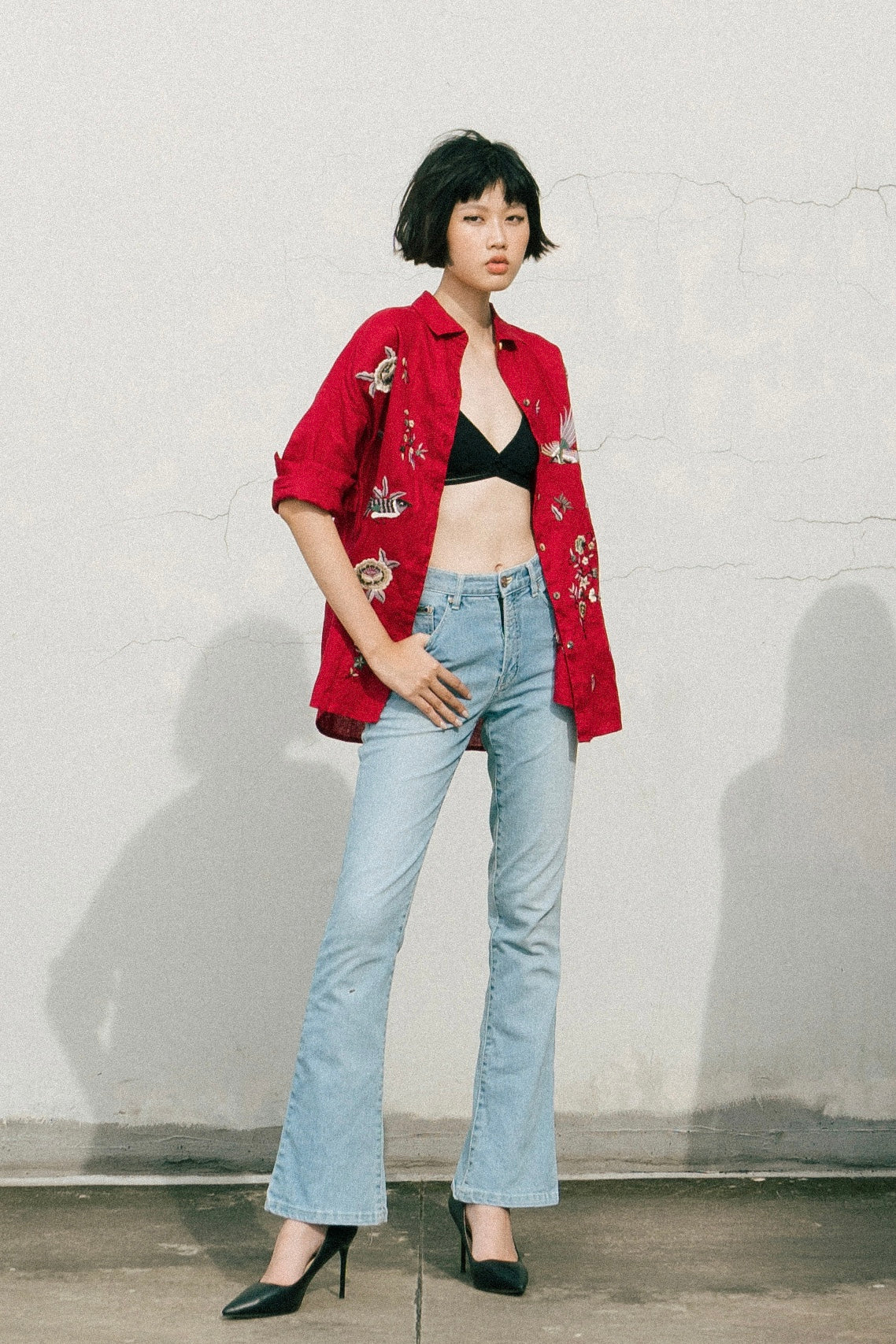 "Fire Phoenix" embroidered red linen shirt by Huulala, featuring floral patterns, Vietnamese cultural design.