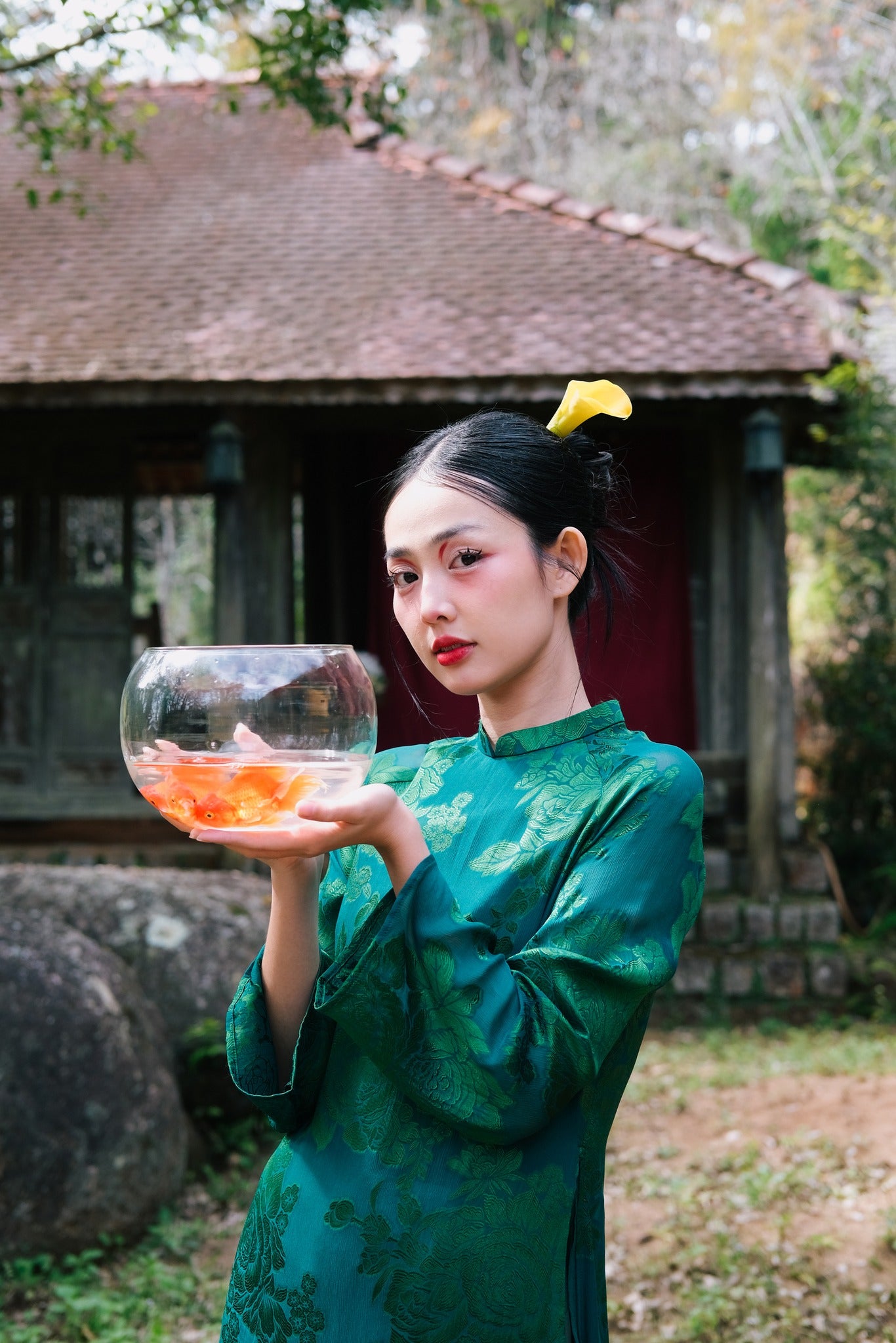 "Traditional Vietnamese Ao dai 'Giai Nhan' in green silk with floral pattern, cultural heritage dress by Moc."