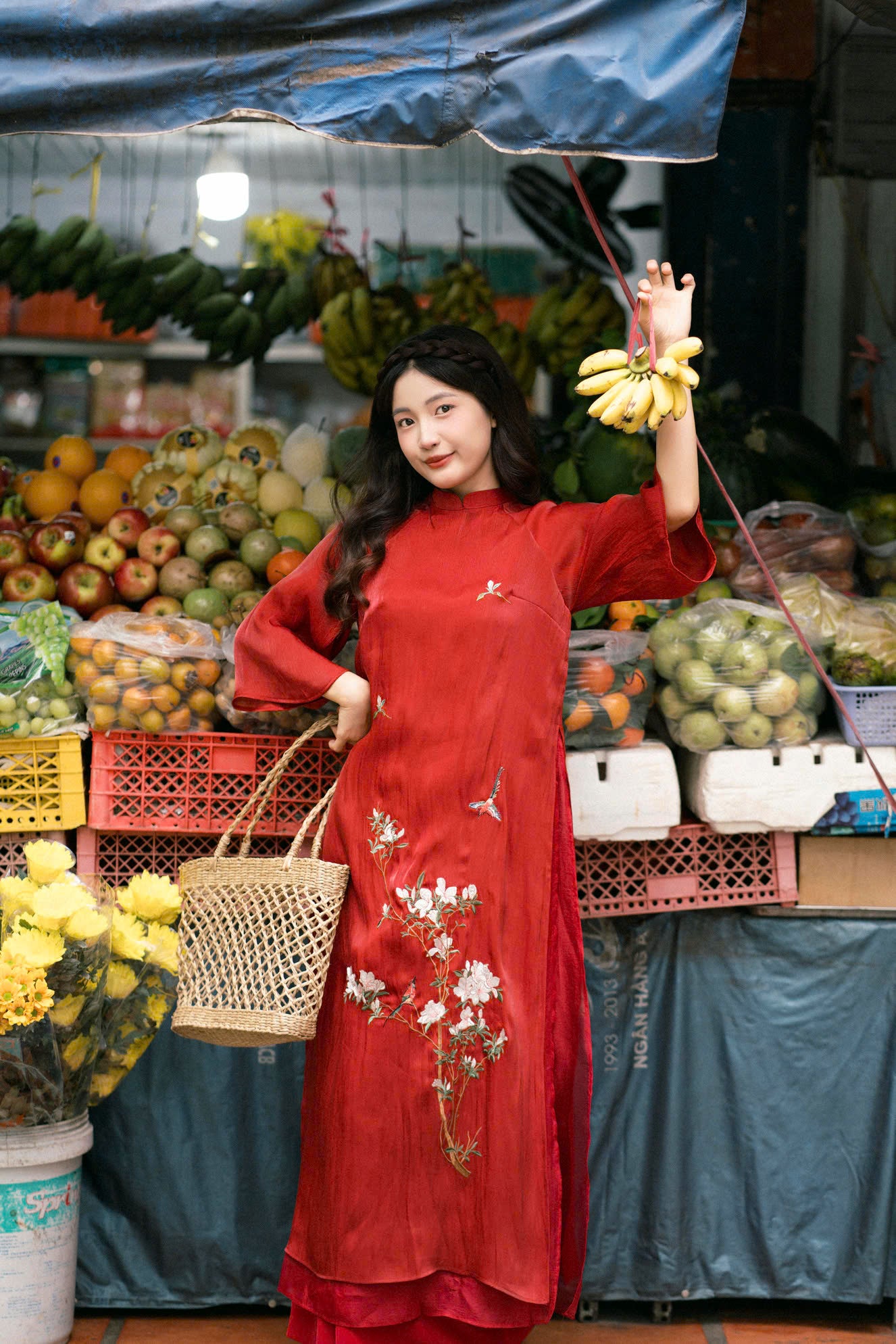 "Red silk 'Giao Mien' Ao Dai with floral embroidery, traditional Vietnamese dress by Moc."