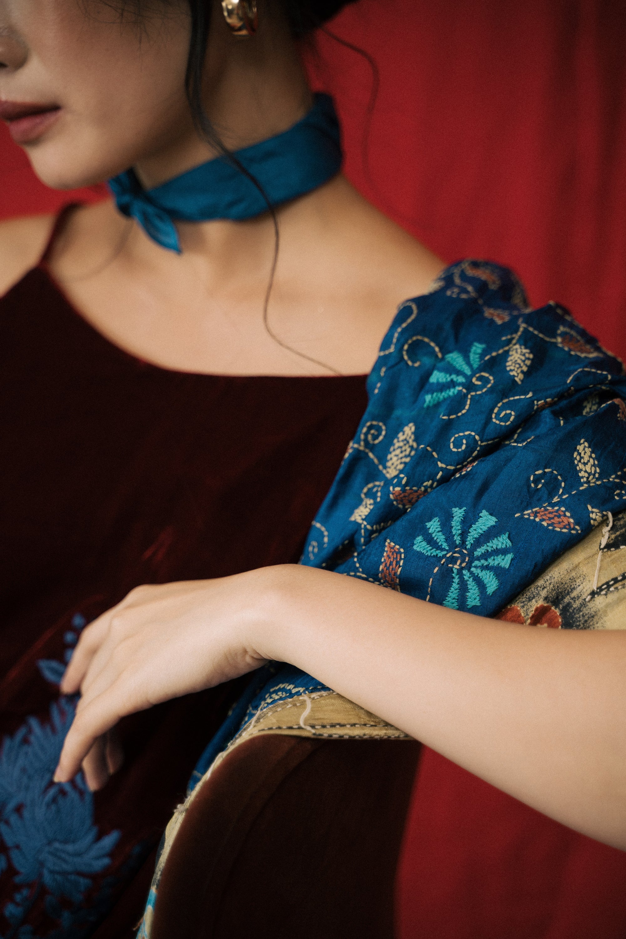 "Rumi - Embroidered Suede dress in Burgundy by Huulala, artisan floral pattern, red and blue accents"