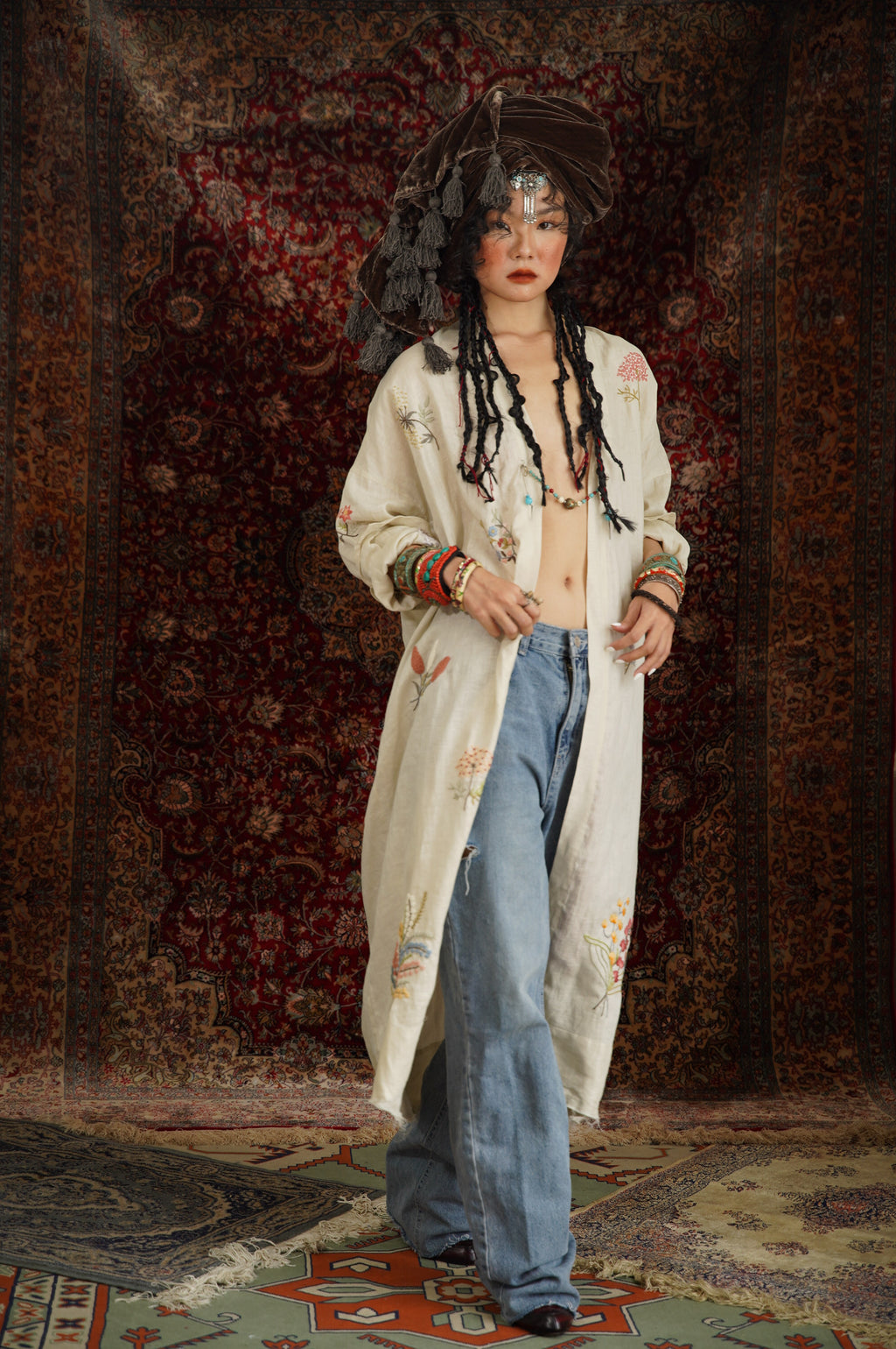 "Terra - Embroidered Linen Cardigan in Black by Huulala, featuring artisan floral patterns, cultural authenticity."