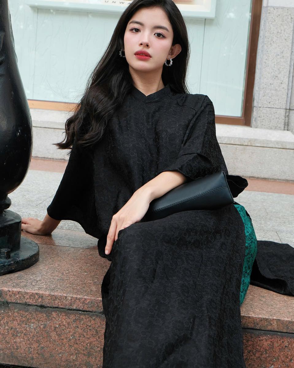 "Huyen Hoa Ao dai set in black silkworm silk, traditional Vietnamese dress by Moc."