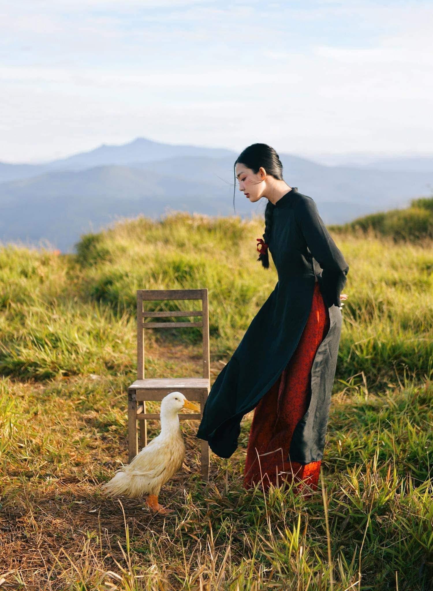 "Traditional Vietnamese Ao dai set 'Huyen Mac' in black and red silk, modern artisan design."