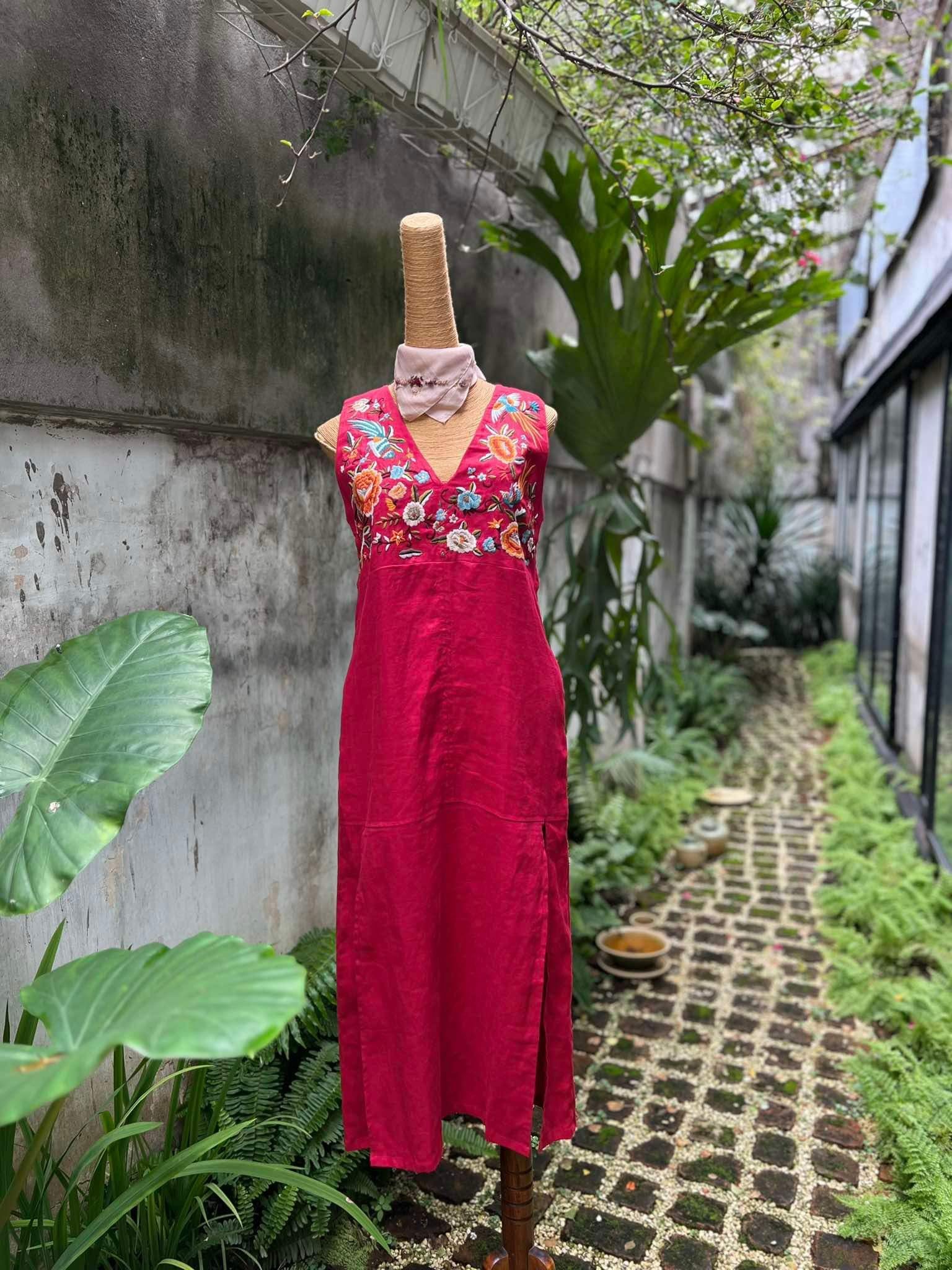 "Phoenix and Flowers" embroidered V-neck red linen dress, modern floral pattern, Vietnamese artisan design.