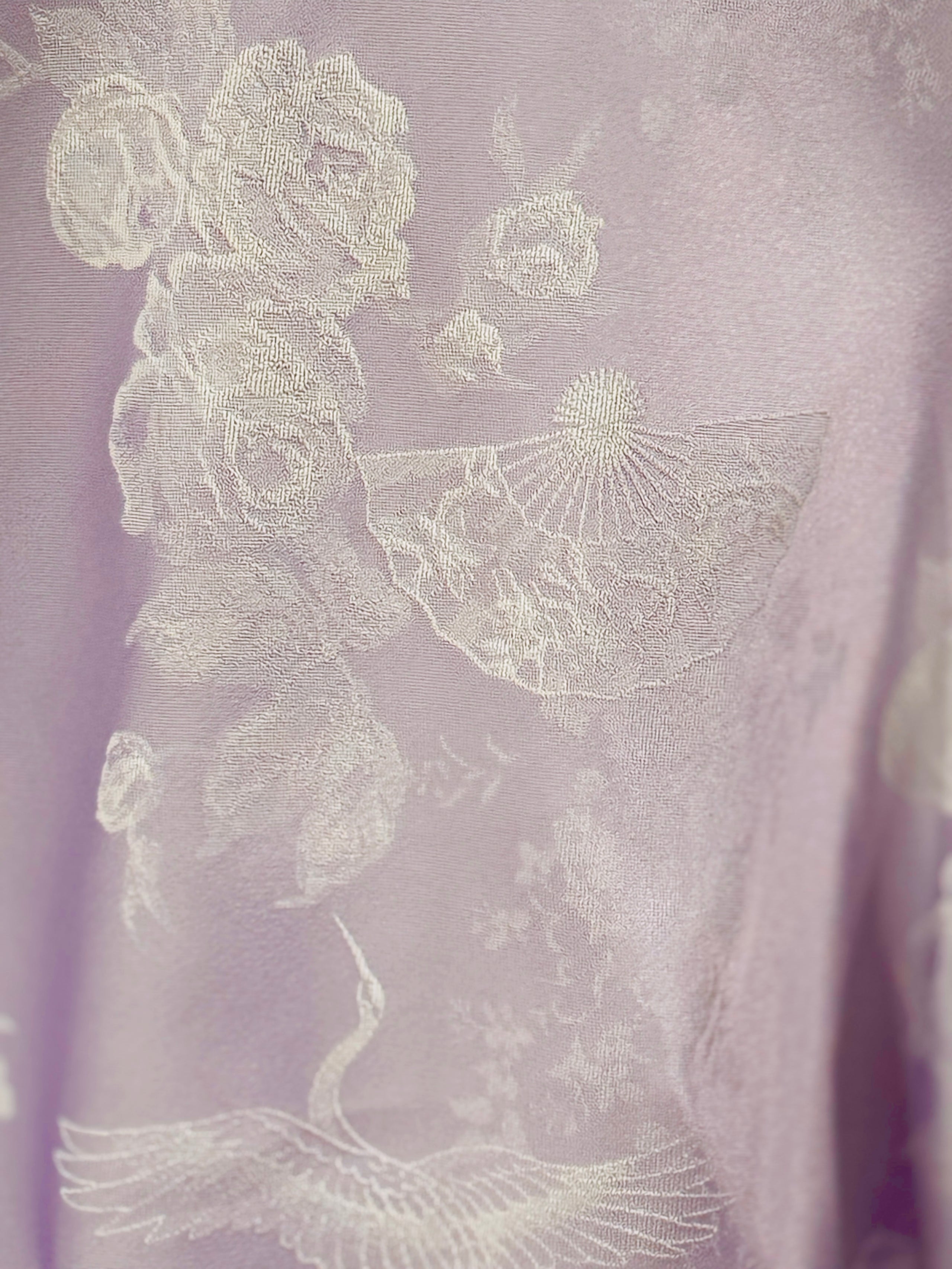 "Hương Trầm" sleeveless cheongsam top in lavender silk with jacquard weave, featuring modern floral and crane patterns by Hy Phuong.