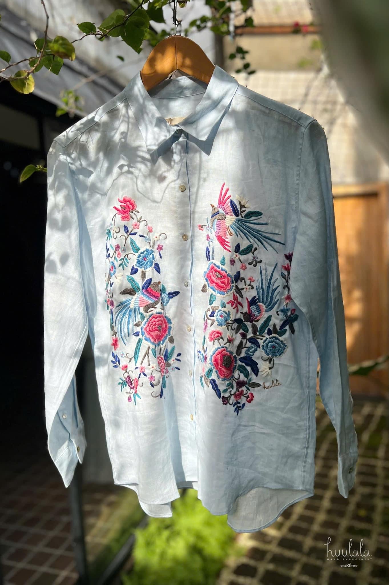 "Zoya embroidered linen shirt by Huulala, light blue with pink floral embroidery, Vietnamese design"