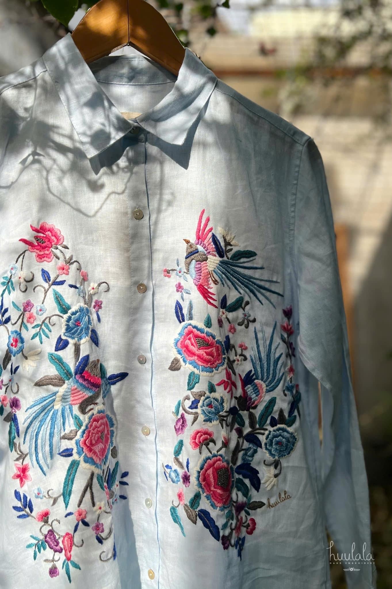"Zoya embroidered linen shirt by Huulala in light blue with pink floral Vietnamese design"