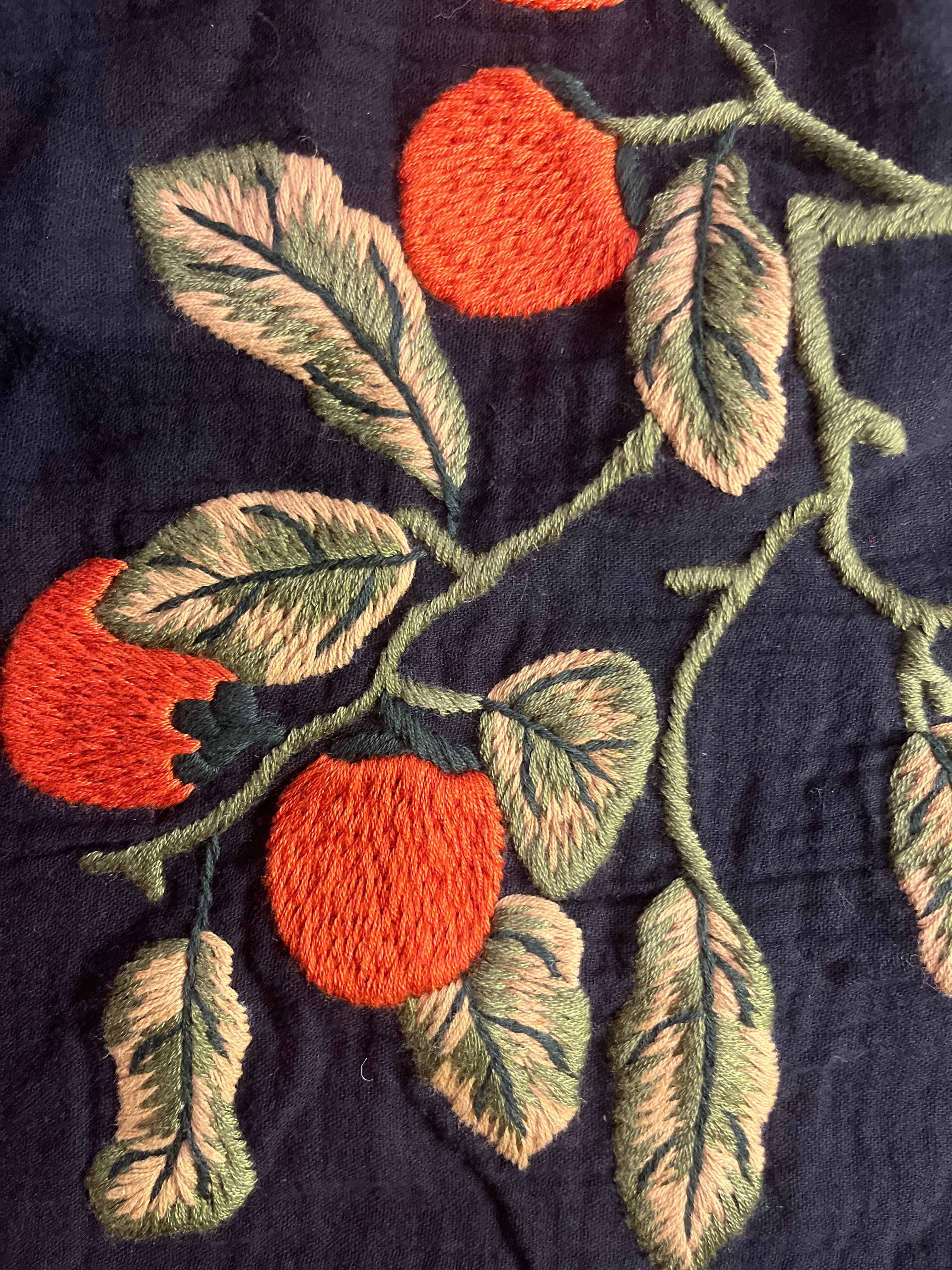 "Persimmon" embroidered muslin dress in black by Huulala, featuring red artisan Vietnamese design.