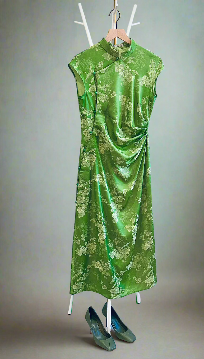 "Sleeveless green cheongsam top in silk jacquard weave with modern floral pattern by Hy Phuong"