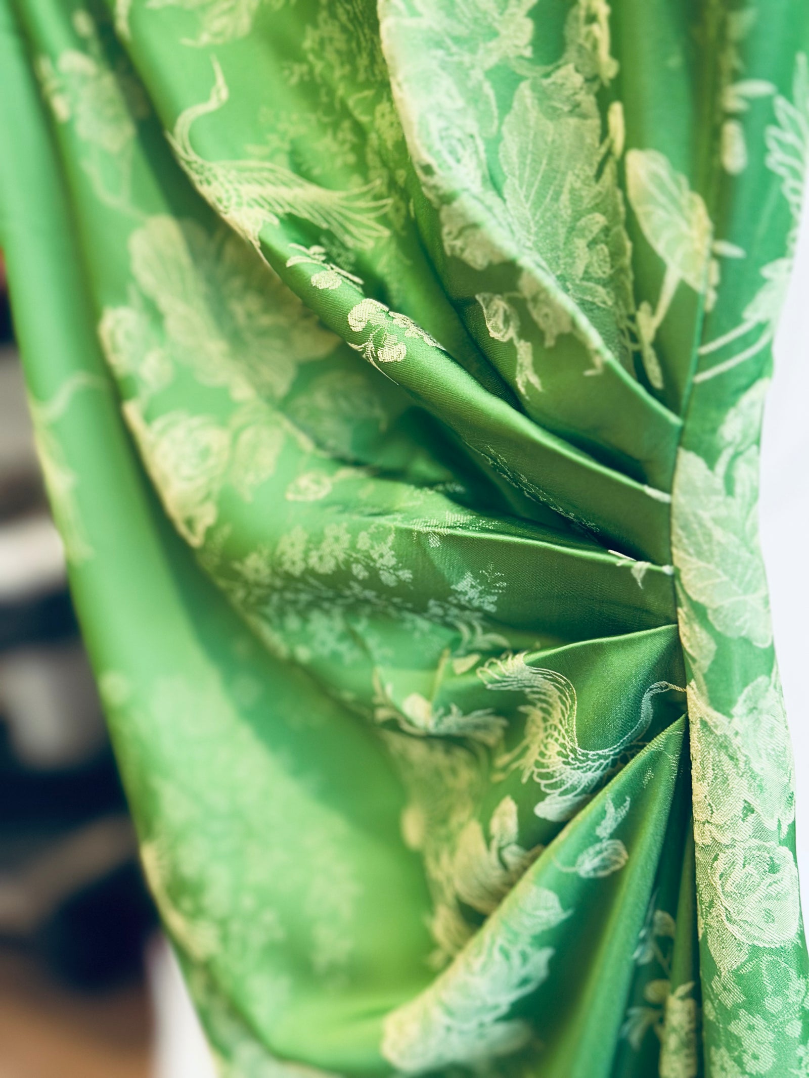 Hương Trầm - Sleeveless Cheongsam in Green with Jacquard weave - detail close-up by Hy Phuong