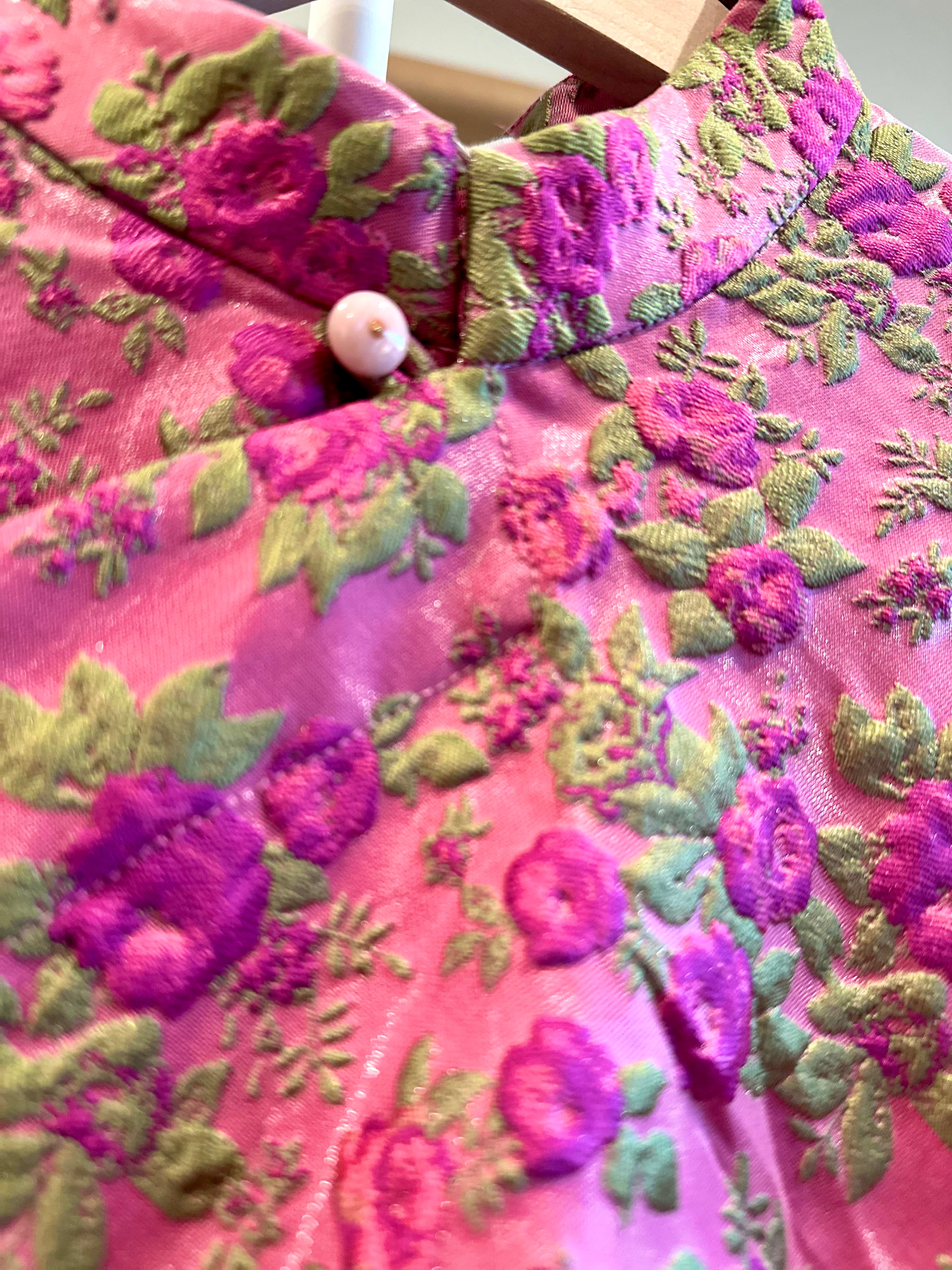 "Hương Trầm" sleeveless brocade cheongsam in magenta silk with floral embroidery, modern Vietnamese top by Hy Phuong.