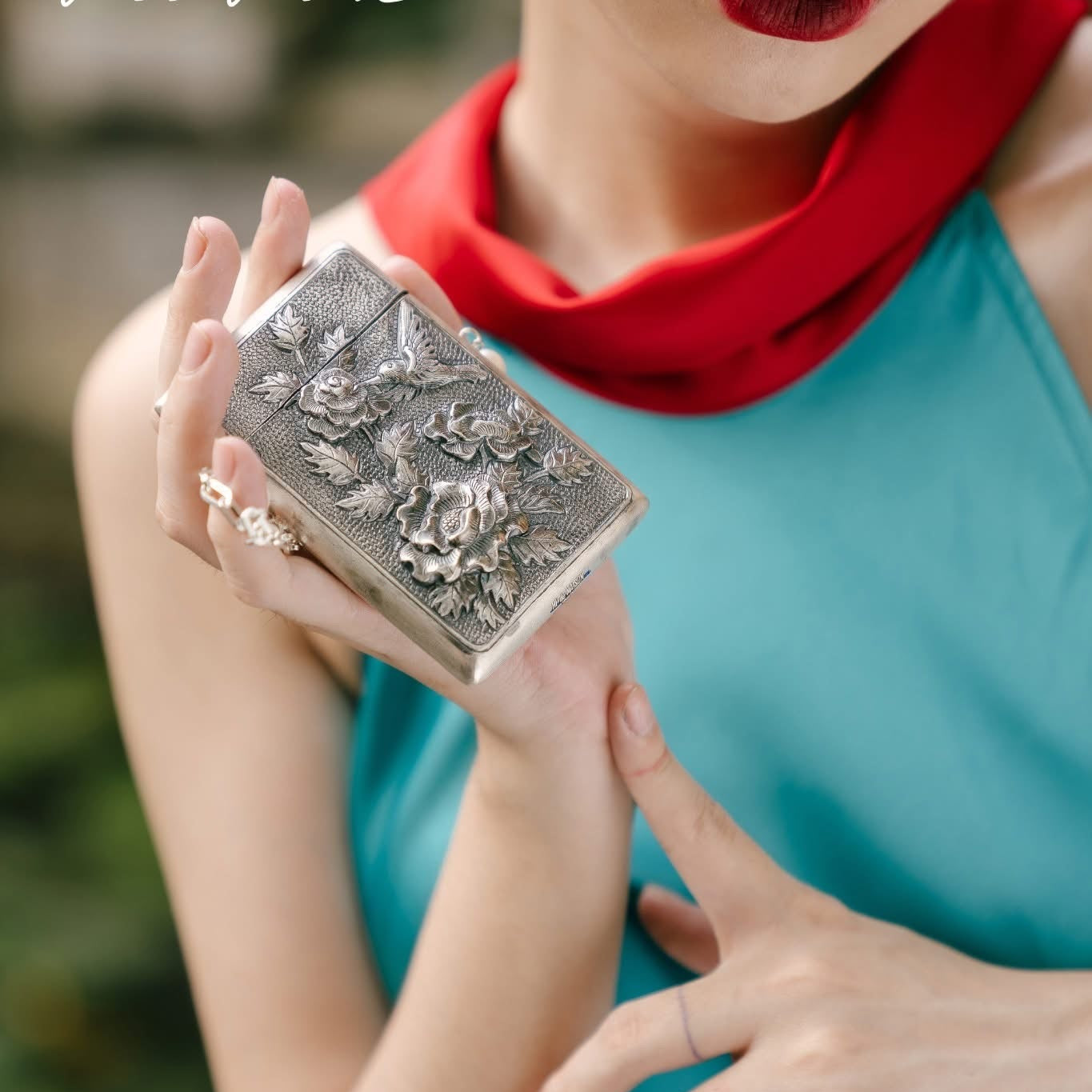 Bach Hoa fine silver mini clutch with embossed peony pattern and gold-tone chain - handcrafted Vietnamese luxury accessory