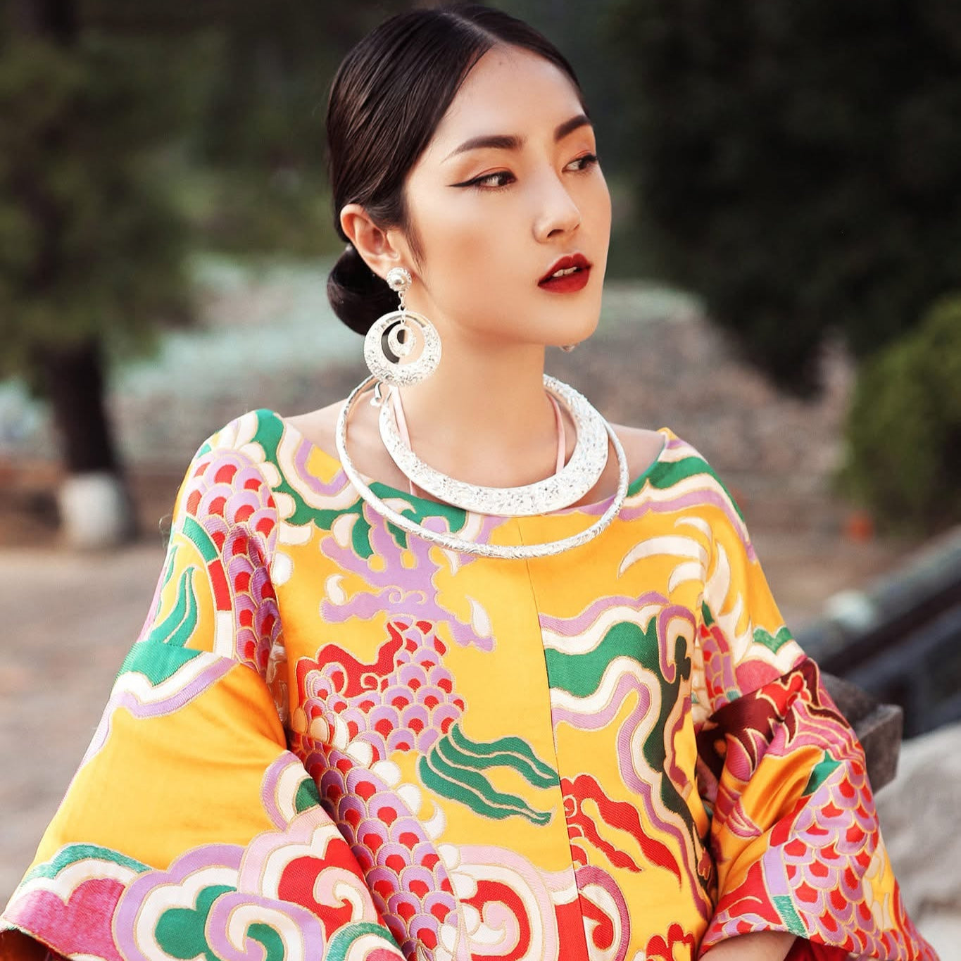 "Traditional Vietnamese 'Nhat Chi Mai' collar necklace in fine silver with red silk, floral artisan design by HI de Maison."