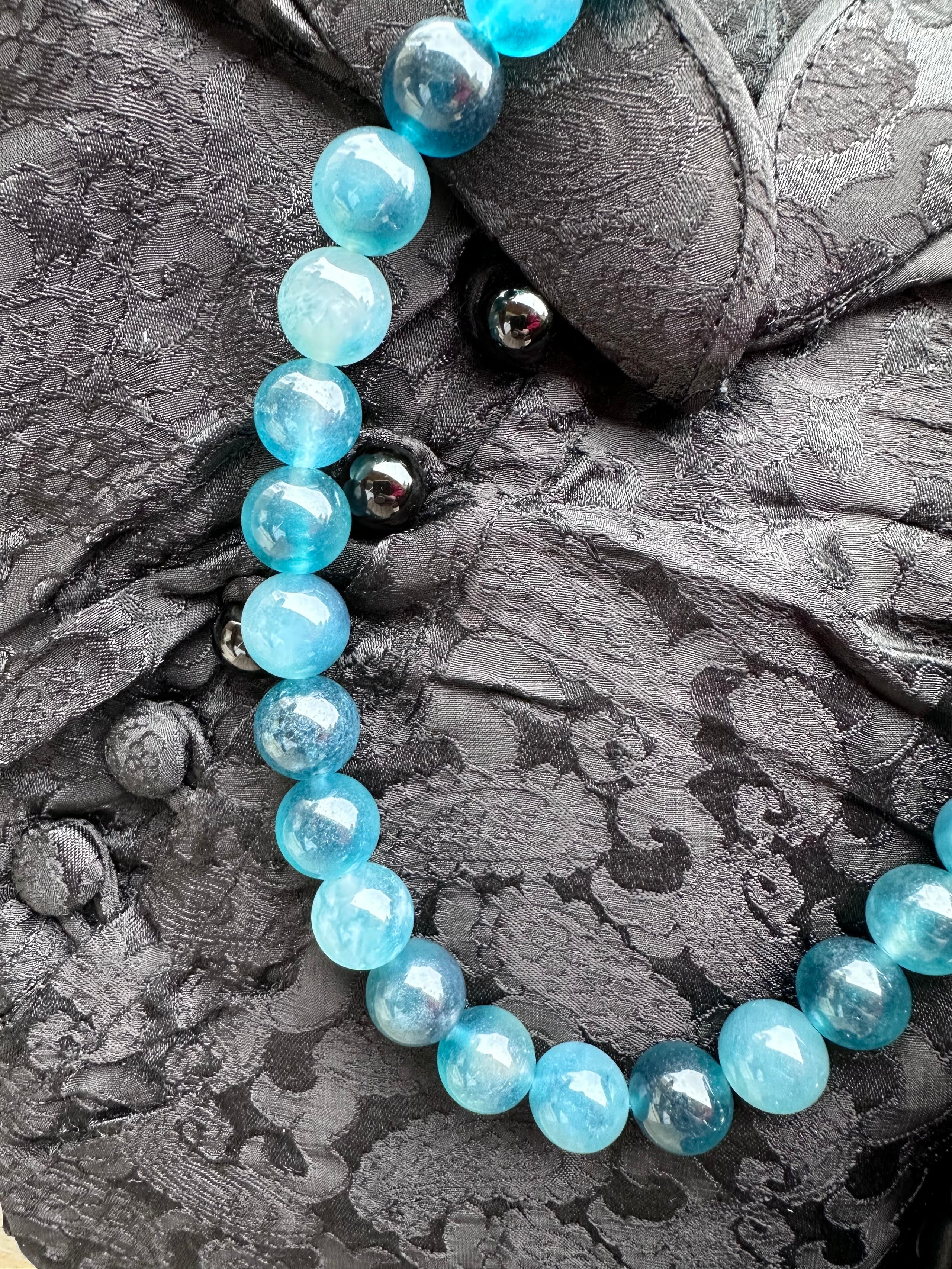 "Verdant Echo" Marble Necklace in Ocean Teal (Large) - back view | Vietnamese Luxury Fashion