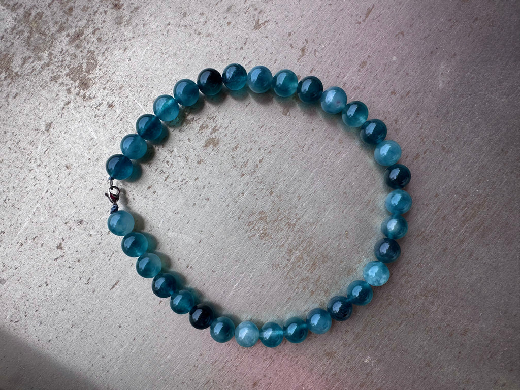 "Verdant Echo" Marble Necklace in Ocean Teal (Large) - lifestyle shot | Vietnamese Luxury Fashion