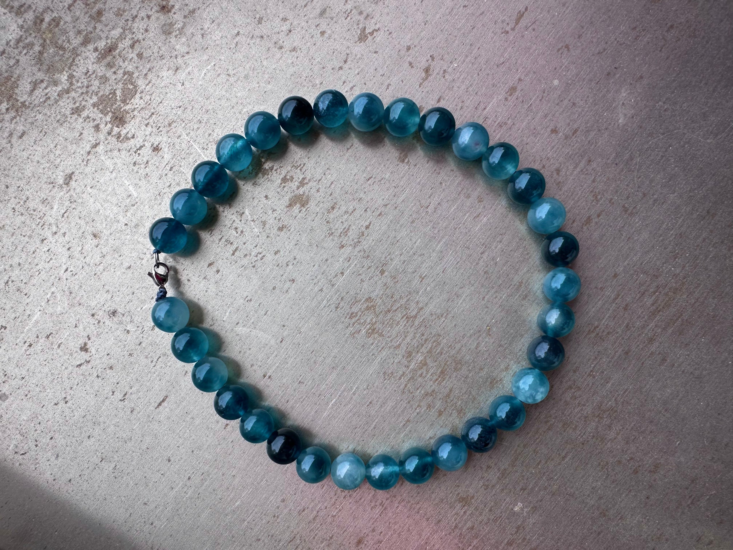 "Verdant Echo" Marble Necklace in Ocean Teal (Large) - lifestyle shot | Vietnamese Luxury Fashion