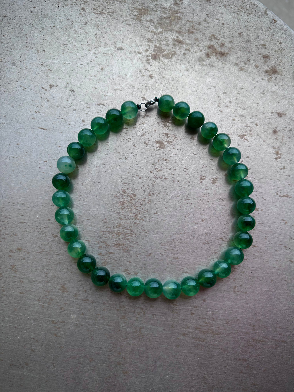 "Verdant Echo" Marble Necklace in Fresh Jade - close-up detail | Vietnamese Luxury Fashion