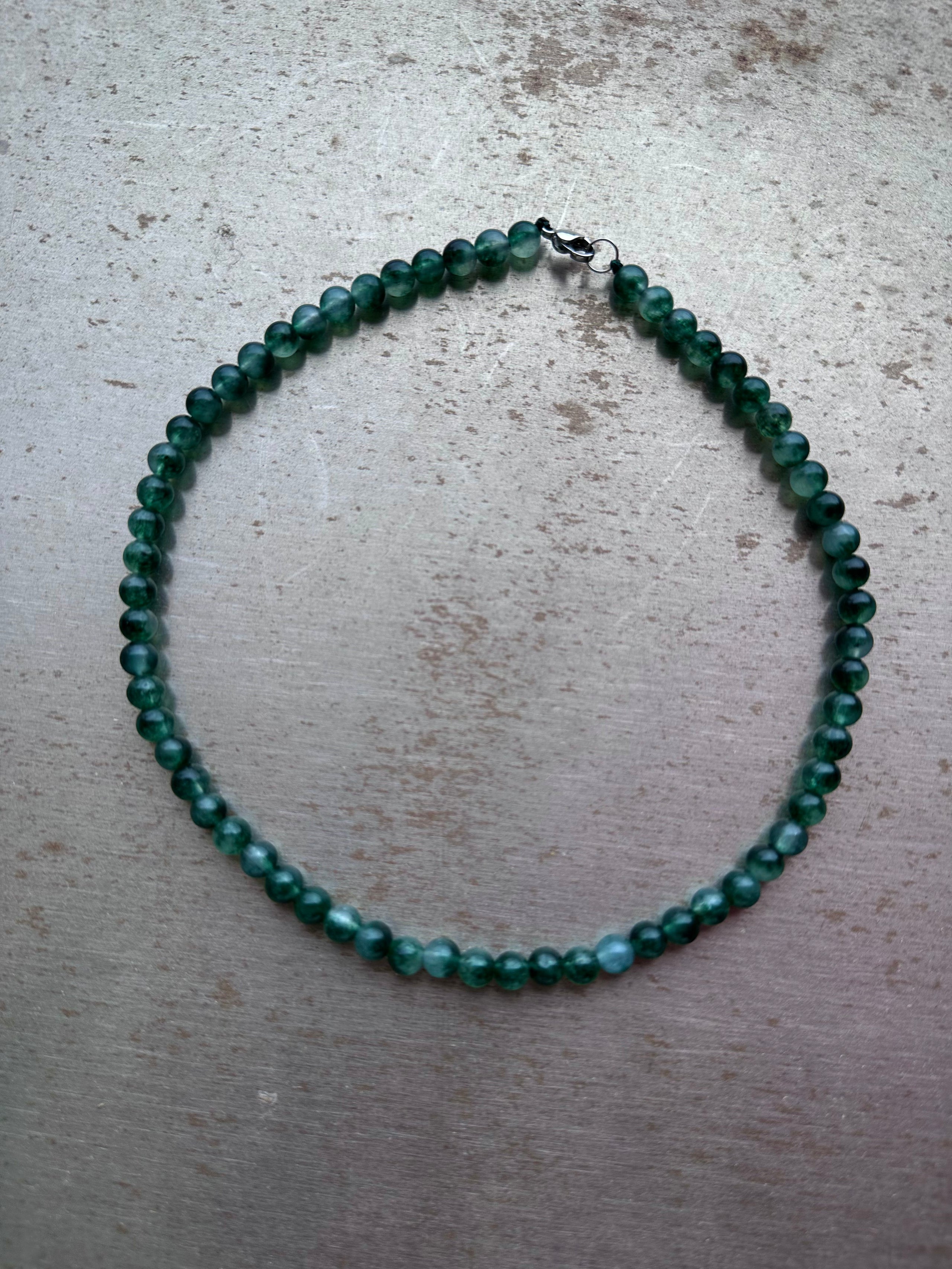 "Verdant Echo" Marble Necklace in Fresh Jade - lifestyle shot | Vietnamese Luxury Fashion