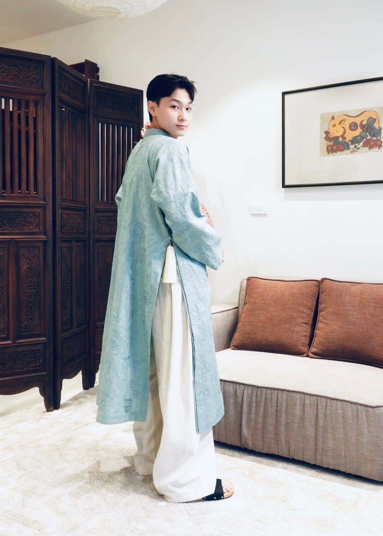 Vietnamese Ao Dai - TAM PHƯƠNG – Men’s Hand-Embroidered Linen Áo Dài - side profile in silk in light blue by Maison LONG