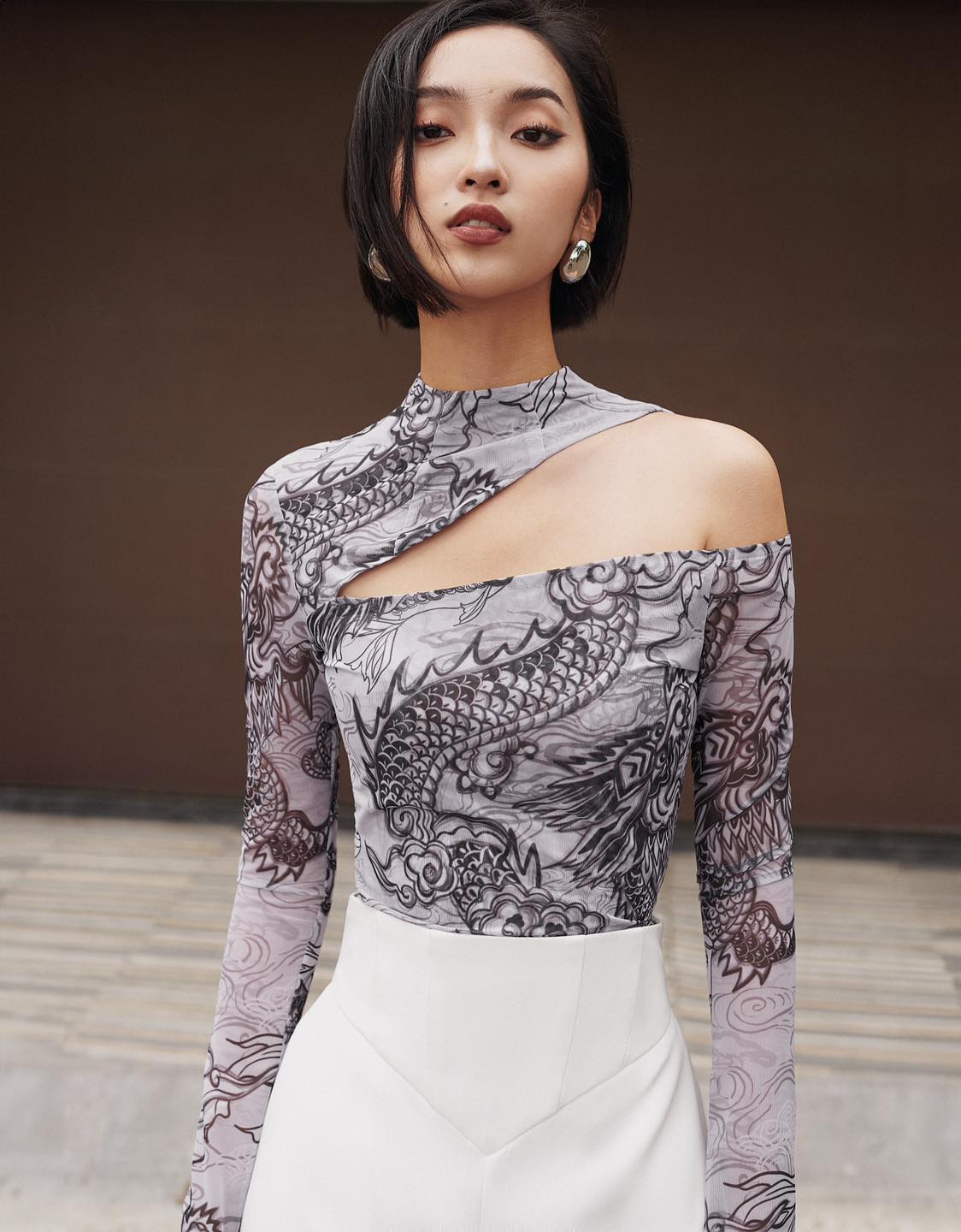 "Jia Chen Cut-out Tulle top in black with traditional dragon pattern by Keira Tong"